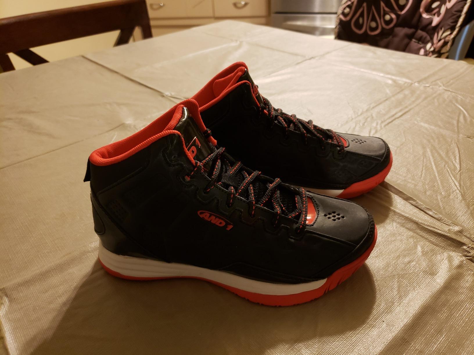 Happy child wearing AND1 Showout basketball shoes showing positive initial experience