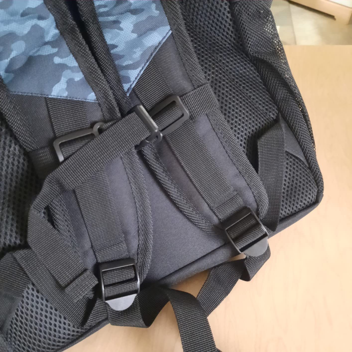 WOLT Basketball Backpack compartments opened showing internal organization and pockets