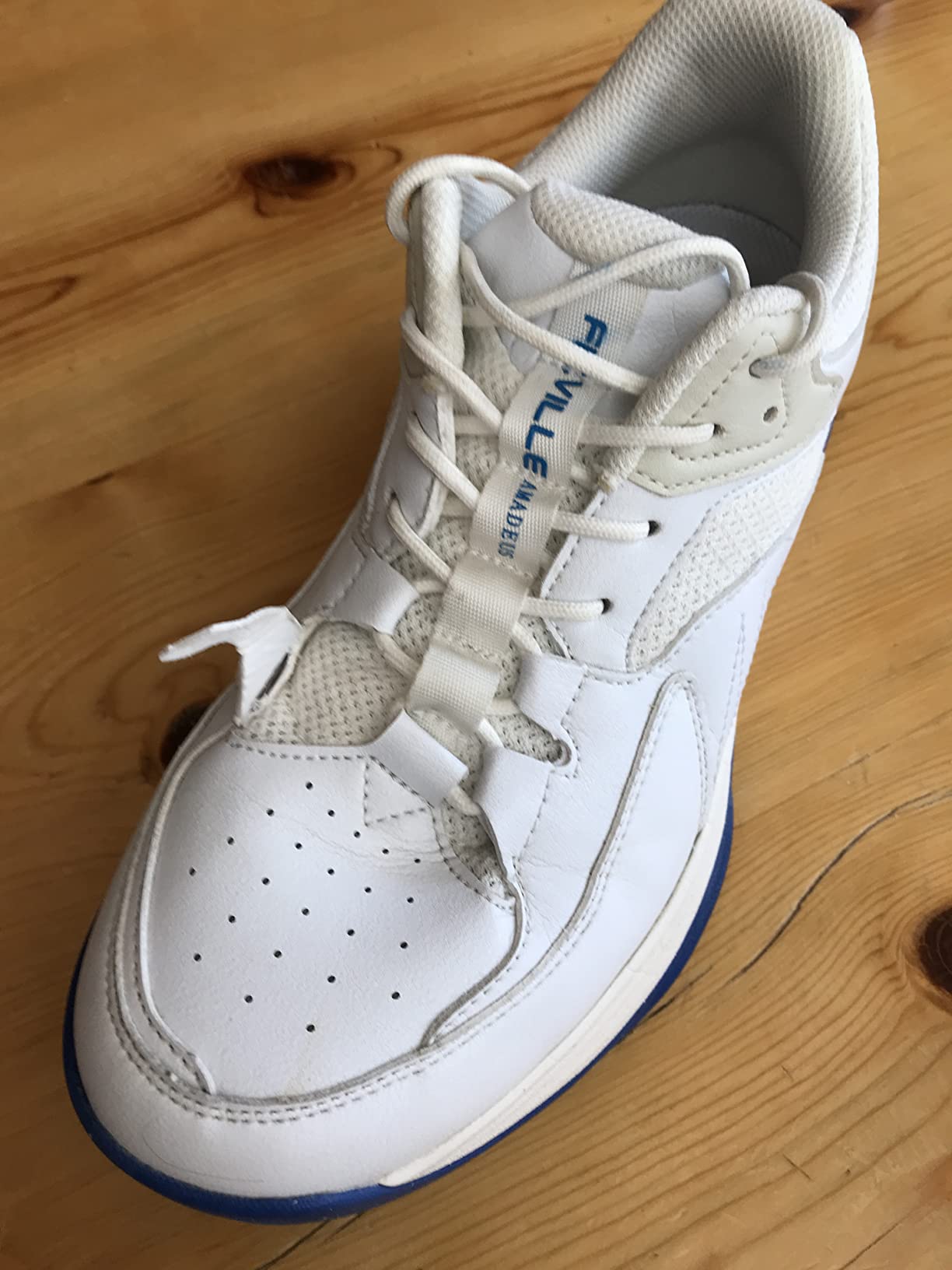 FitVille shoe construction detail showing eyelet failure and stitching issues after regular pickleball use