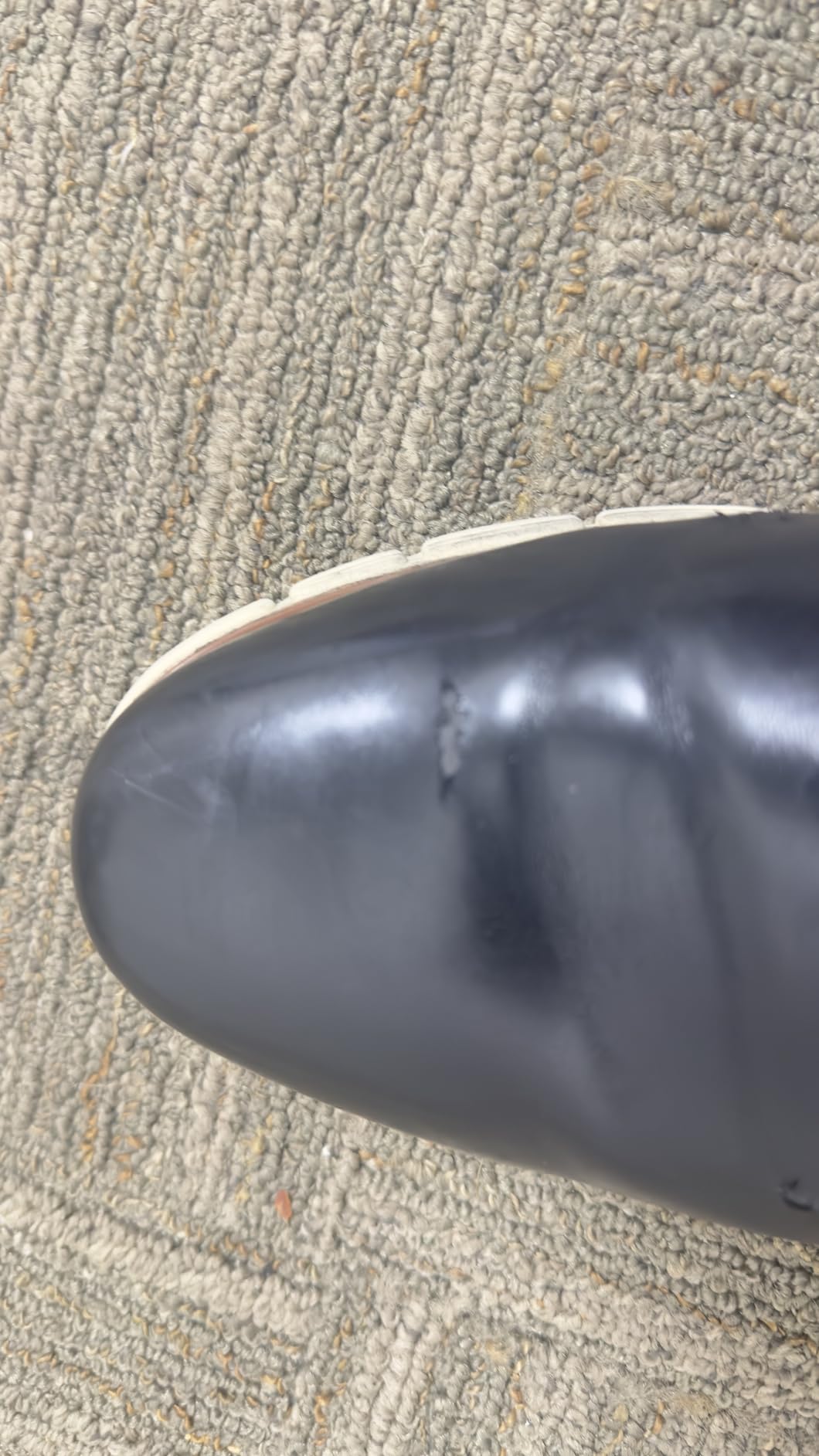 Example of material cracking and wear on Bruno Marc dress sneaker showing durability concerns after regular use
