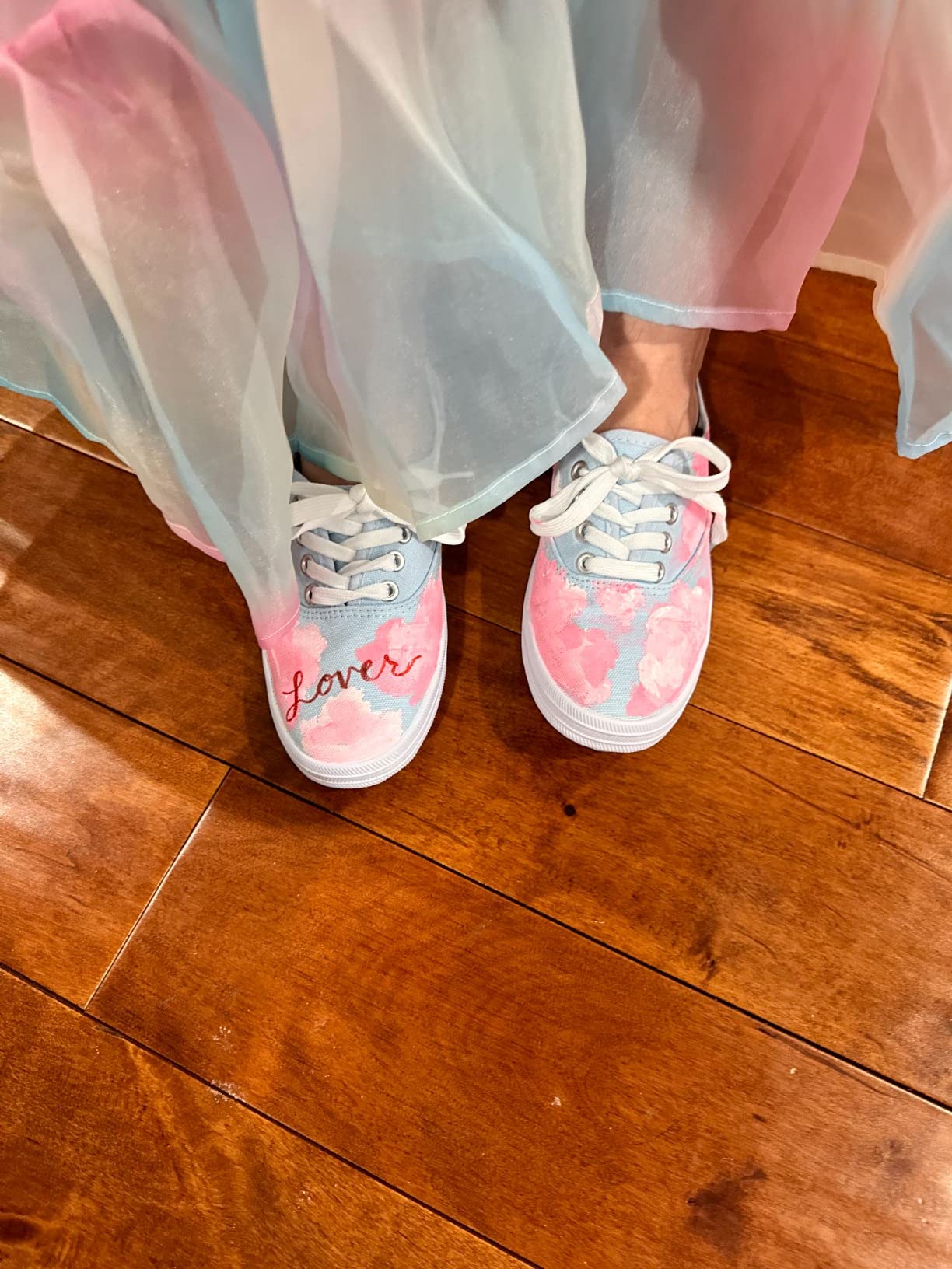 TUOPIN sneakers with painted design showing customization potential for creative projects