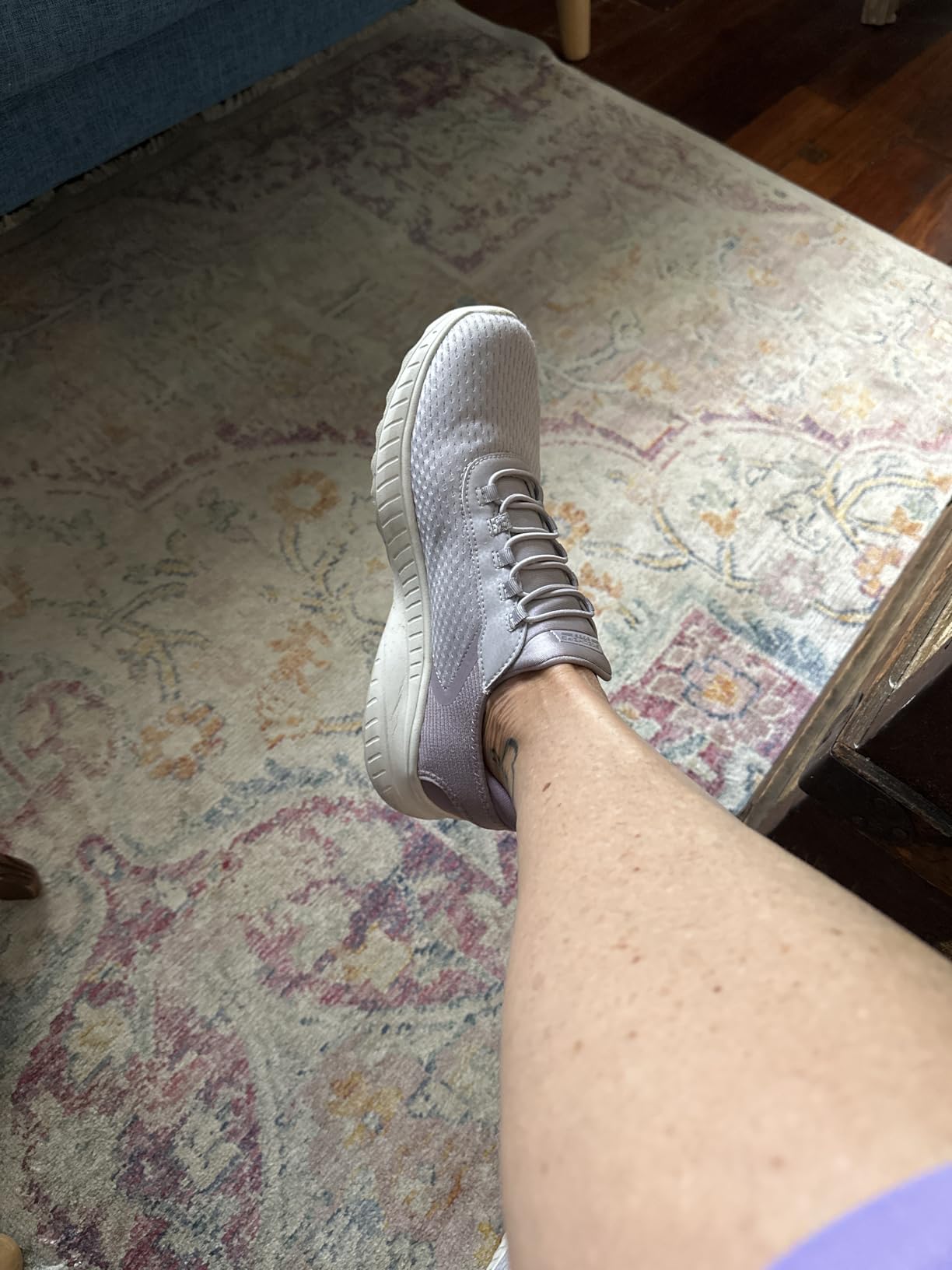 Final product shot of Skechers Women's Slip-ins showing complete shoe design and features