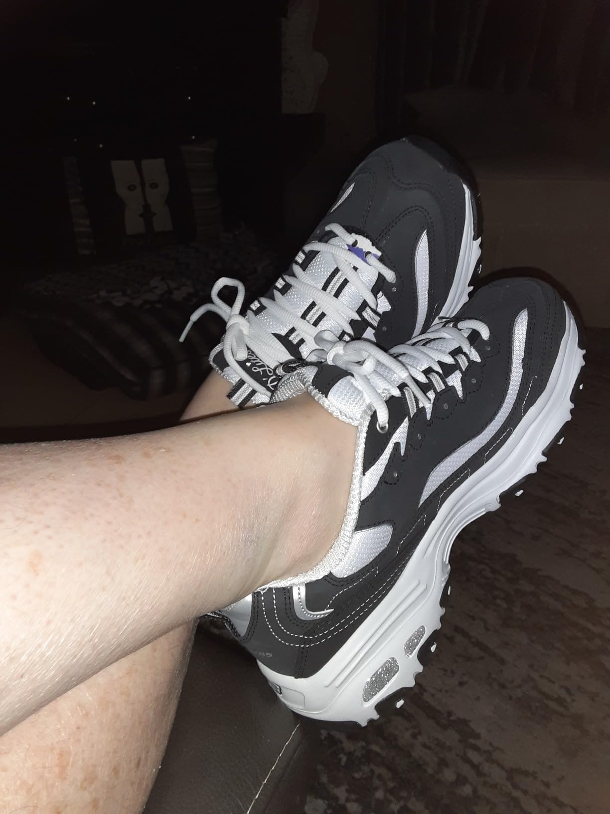 Skechers D'Lites being worn during daily activities showing versatility and comfort for extended wear