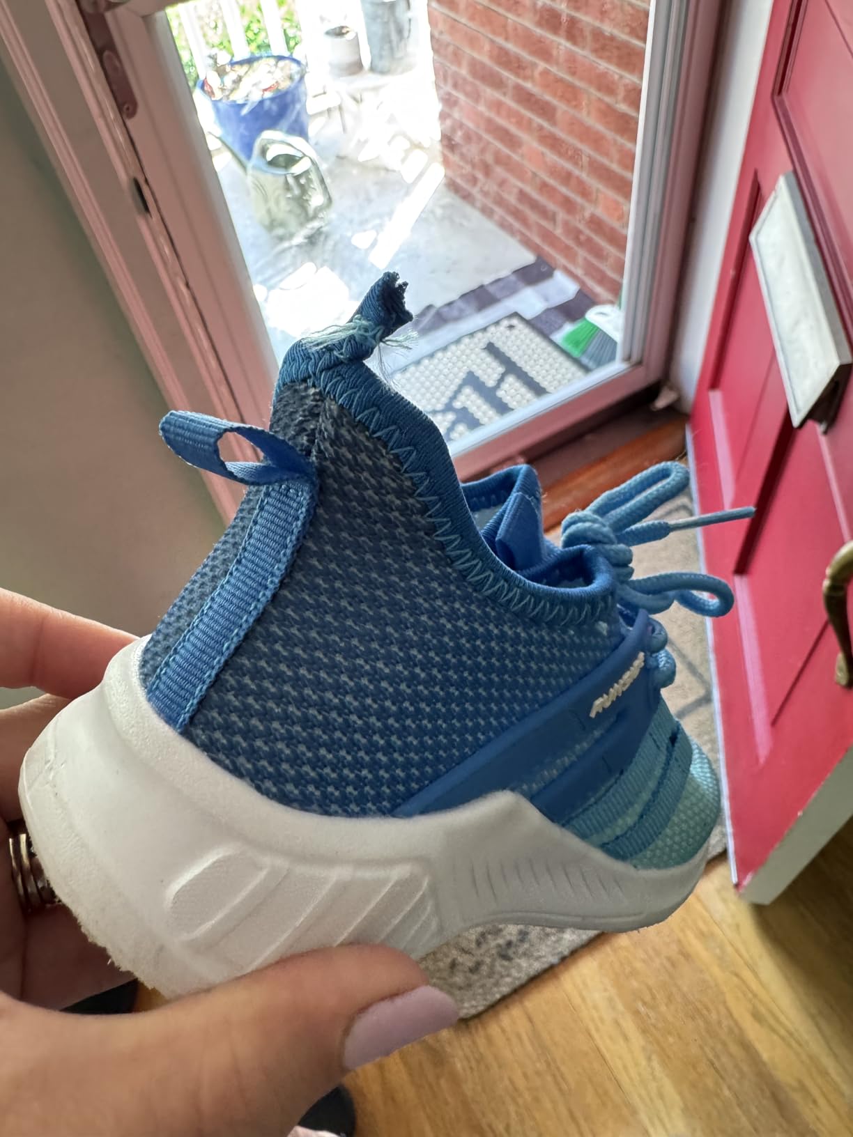RUNSIDE Kids Tennis Shoes showing construction details and potential wear points