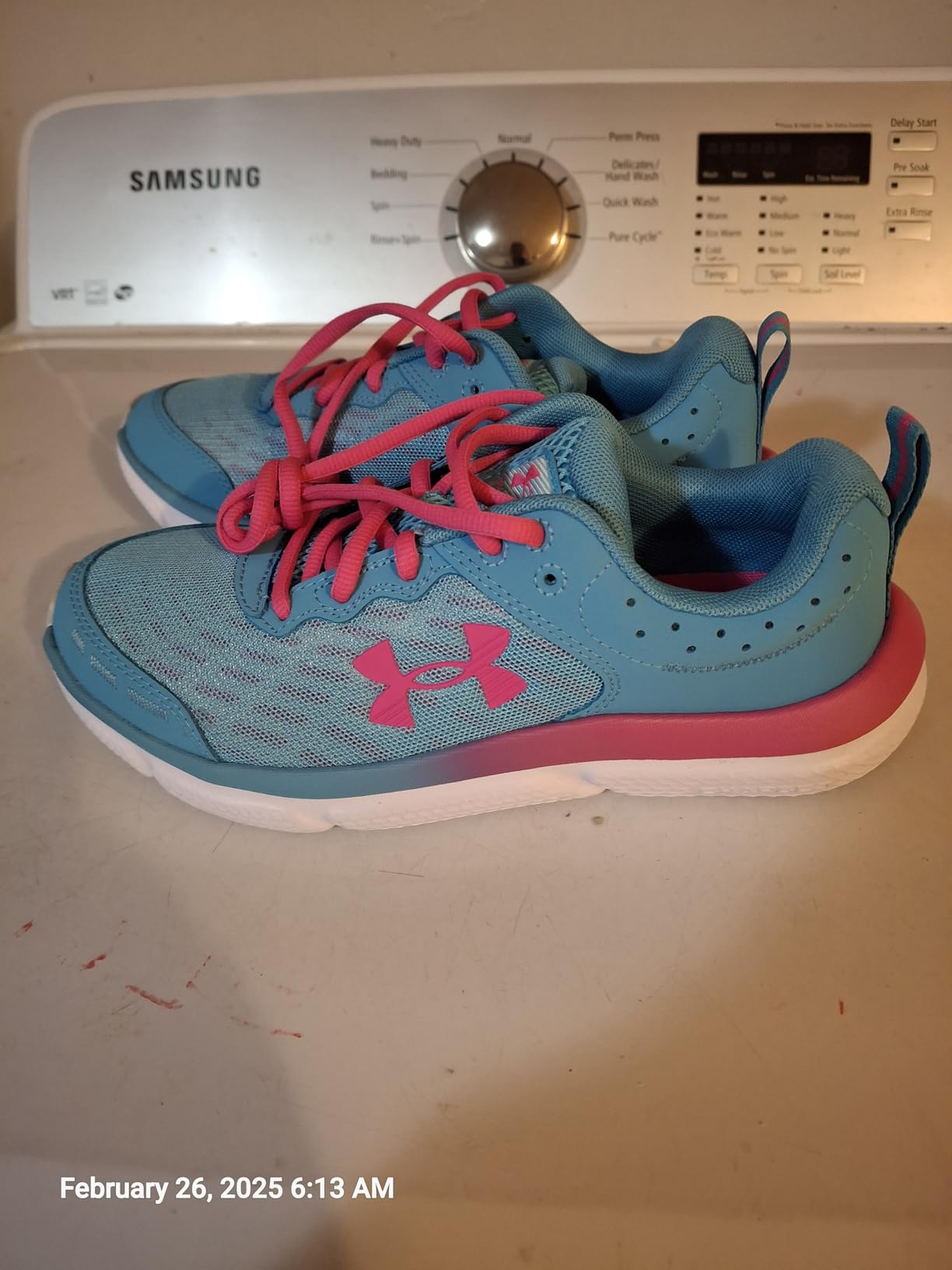 Under Armour Assert 10 final product shot showing complete shoe design