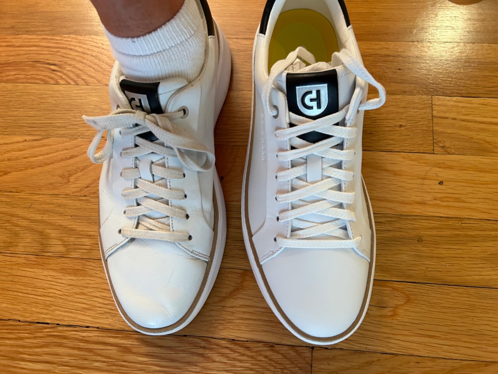 Final product shot of Cole Haan Grandpro Topspin showcasing the premium white leather construction and refined design