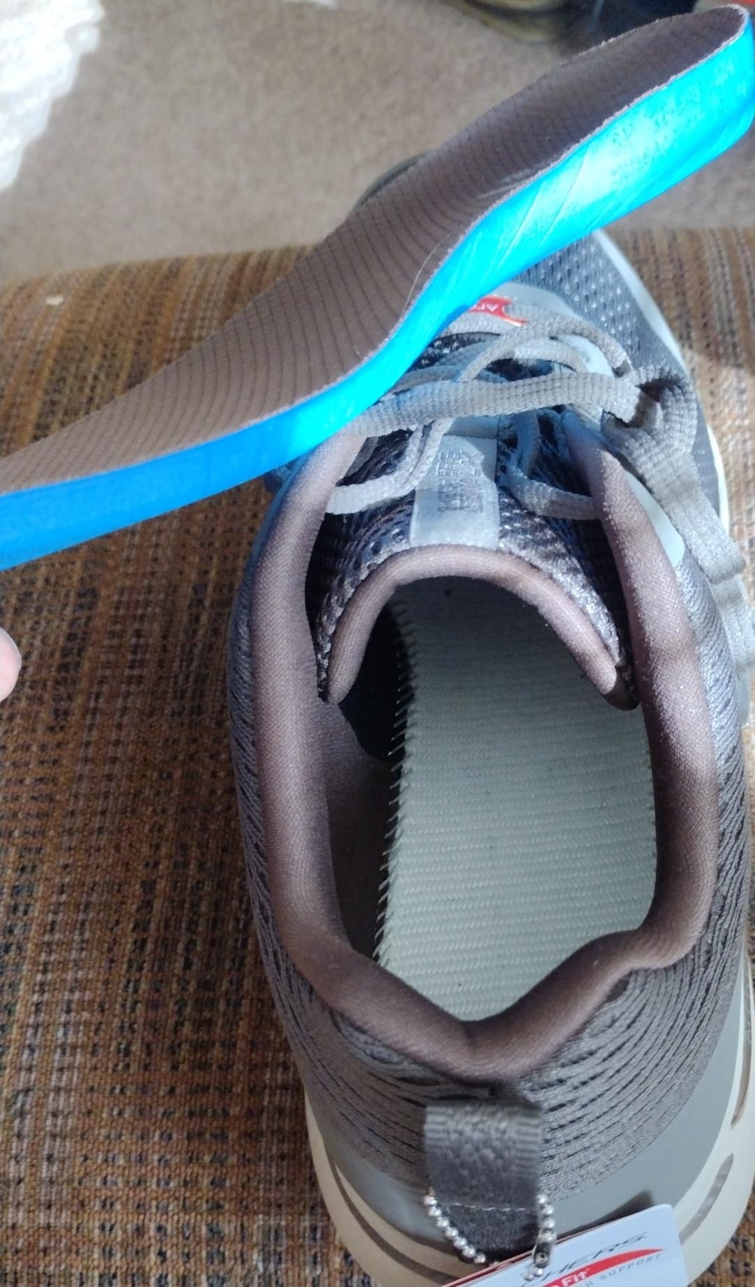 Skechers GoWalk interior showing removable arch fit insole system and construction details