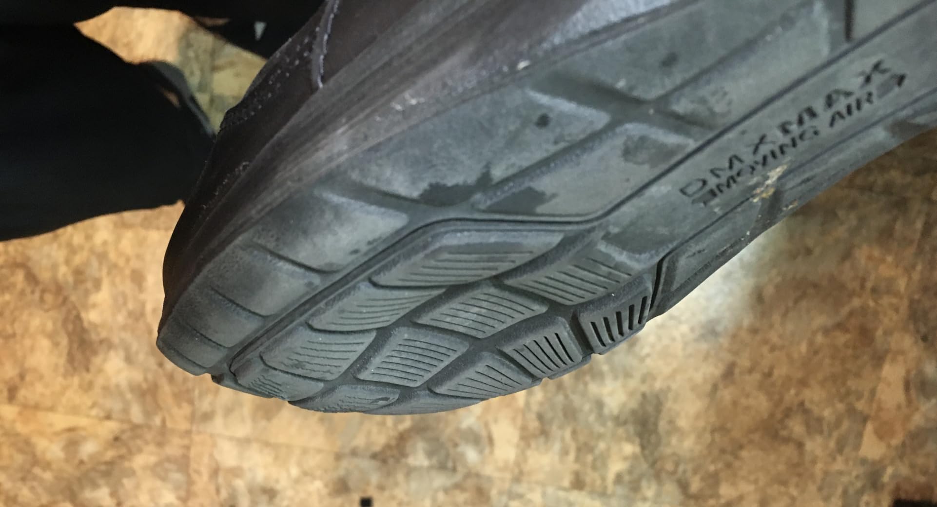 Worn Reebok walking shoe showing sole separation and durability issues after extended use
