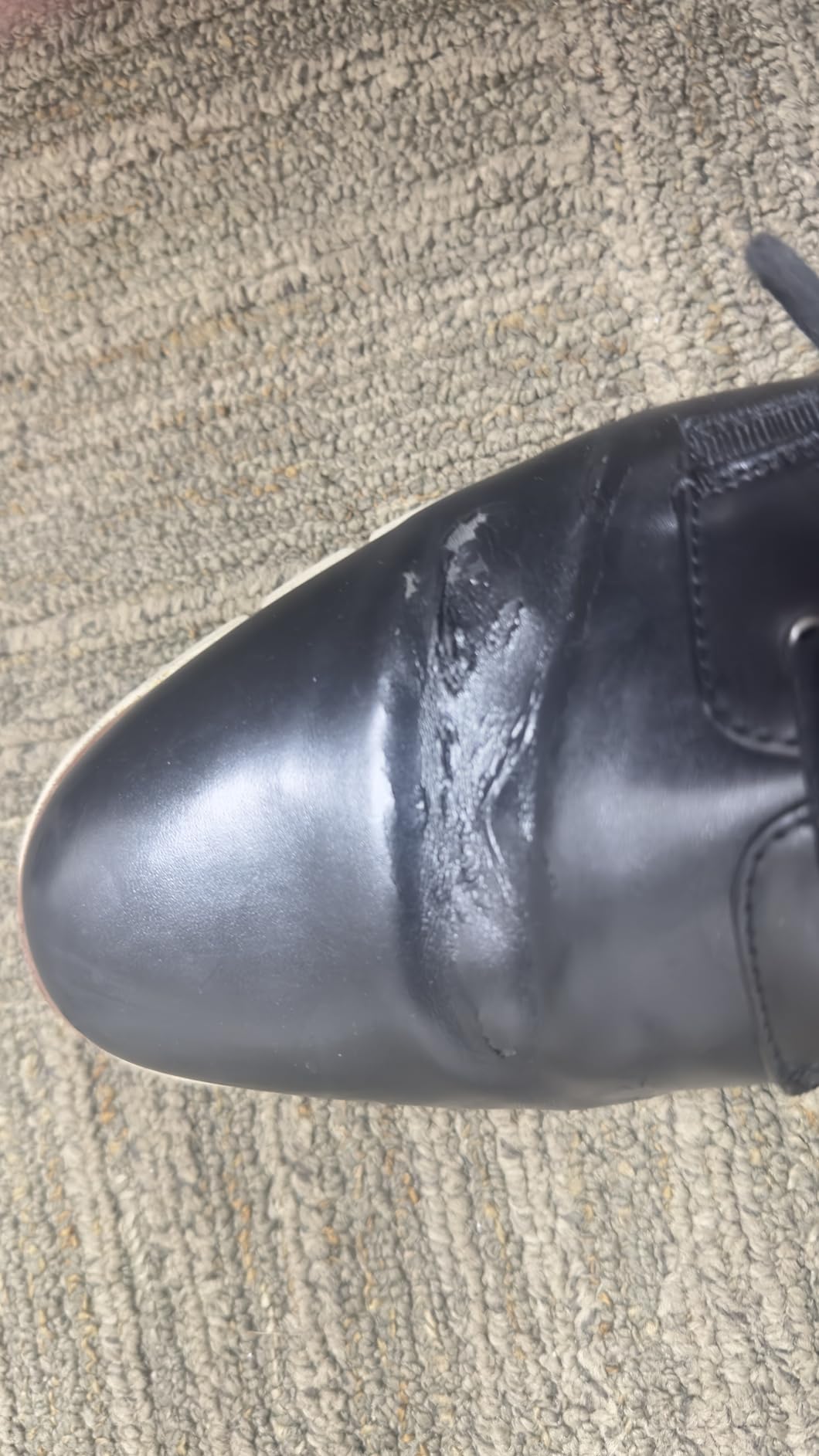 Bruno Marc dress sneaker showing significant material breakdown and separation at stress points