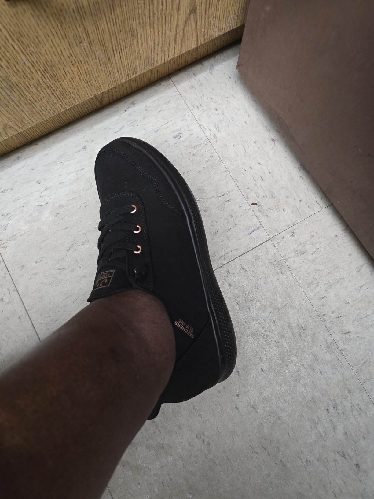 Skechers marketing materials showing hands-free slip-in technology demonstration