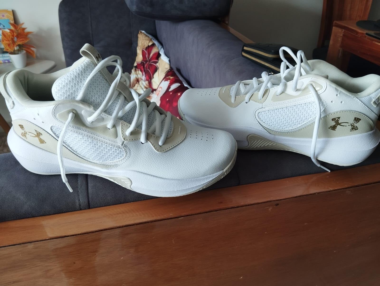 Under Armour Lockdown 6 basketball shoes in action during court play showing traction and lateral support