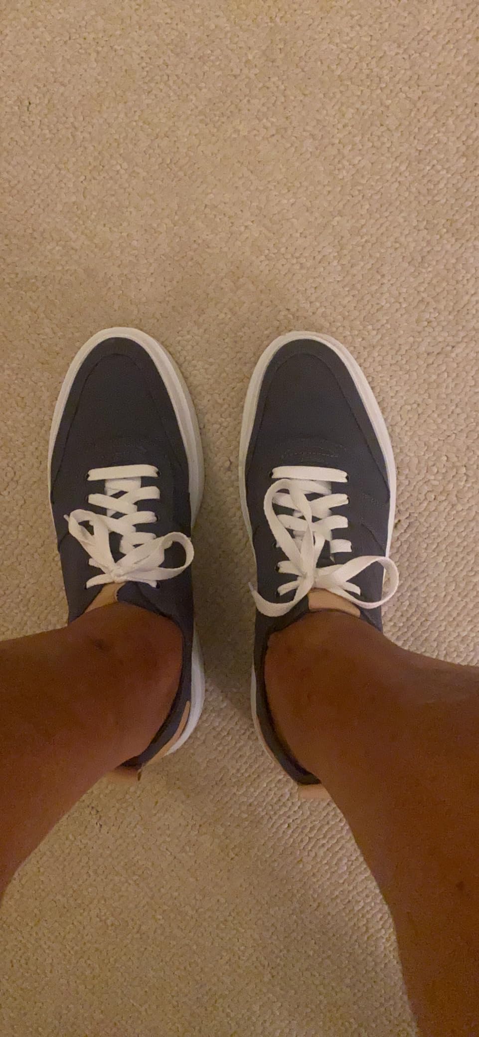 Cole Haan GrandPro Rally with white laces showing clean aesthetic and canvas material detail