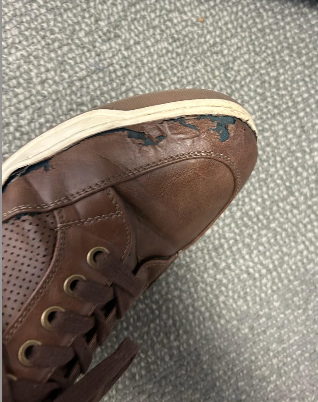 Side profile showing the sleek design and heel construction of Jousen fashion sneakers