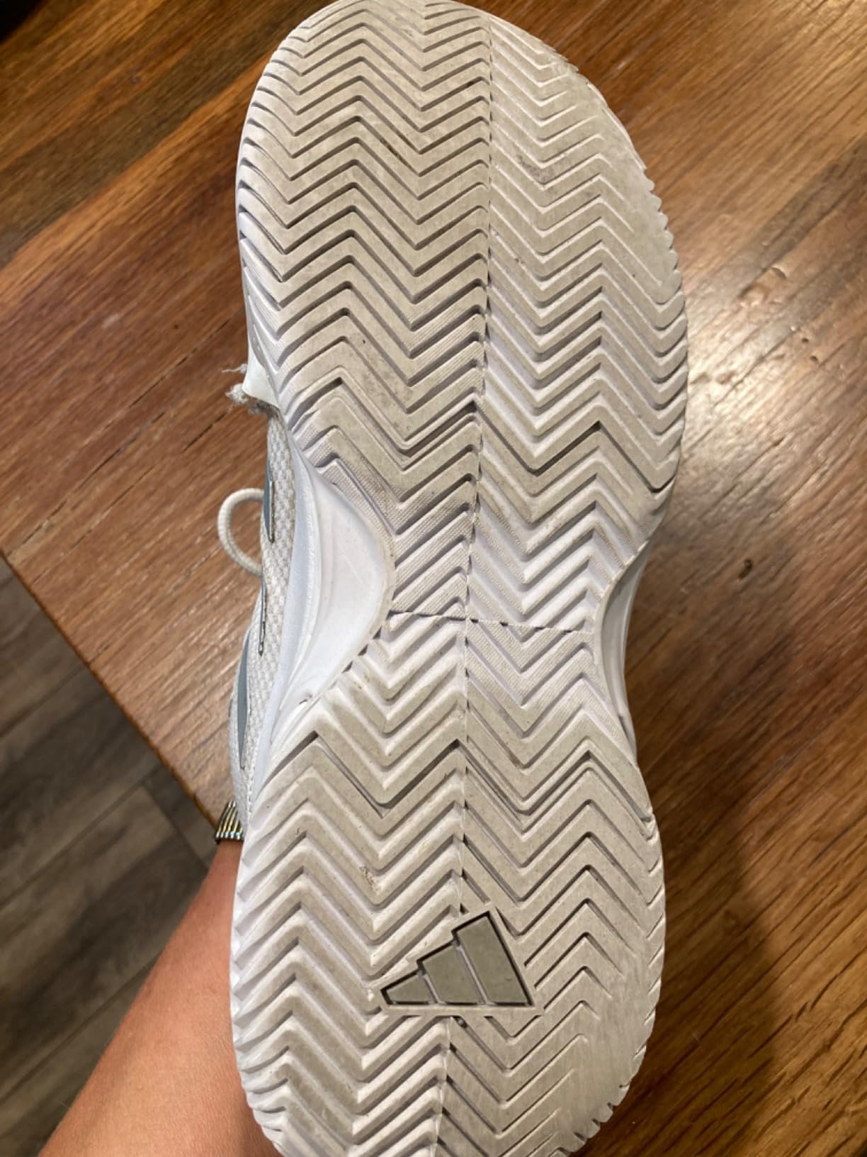 Side view showing seam separation issue along mesh and rubber junction after extended use