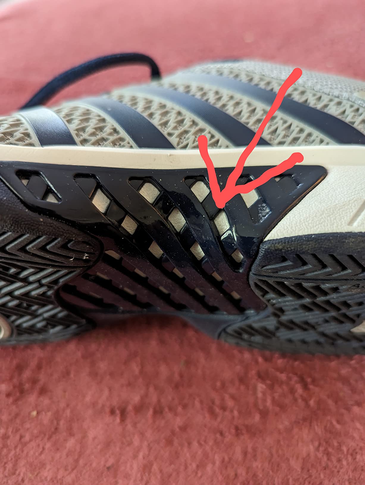 K-Swiss Express Light construction detail showing plastic webbing and potential wear points
