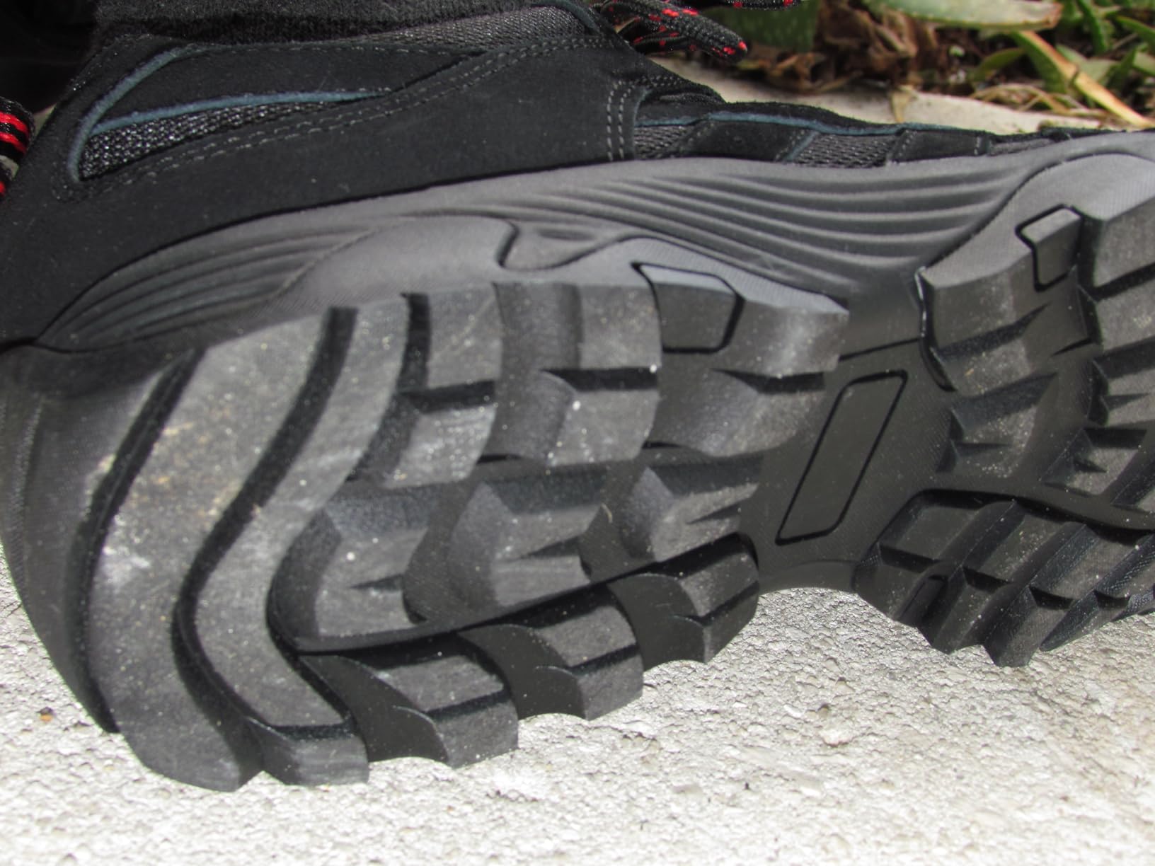 Testing SHULOOK shoes on steep rocky terrain showing grip and stability