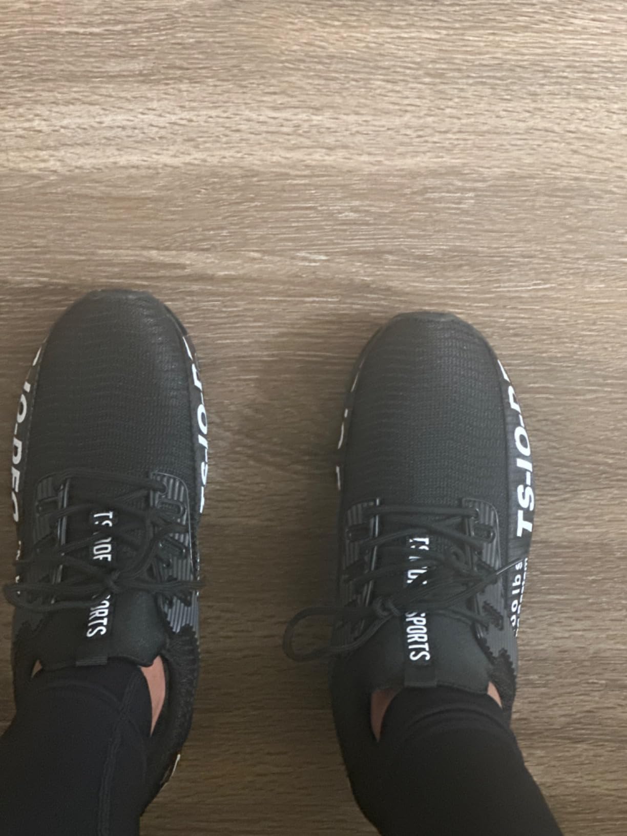 FRSHANIAH athletic shoes worn during casual daily activities showing practical usage