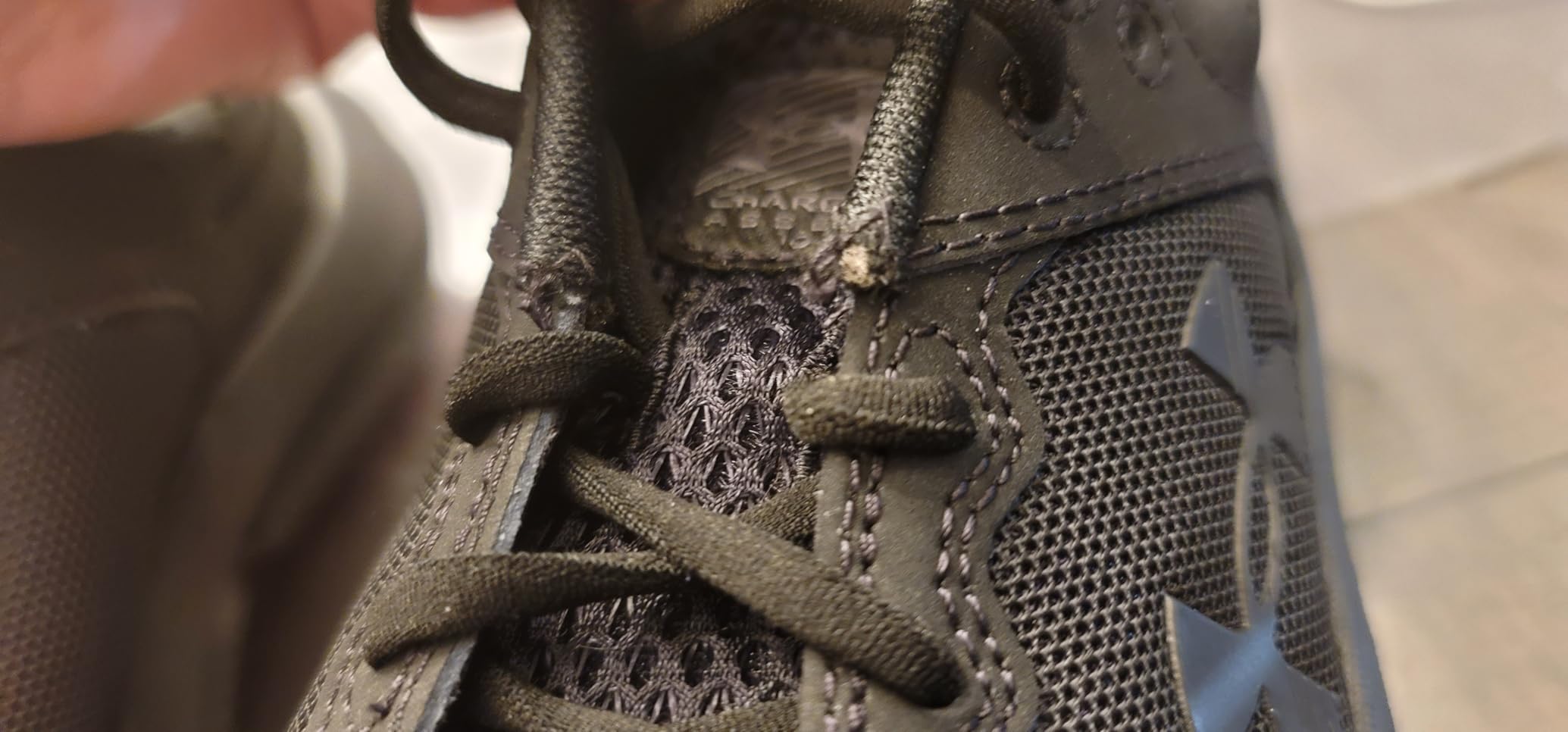 Under Armour Assert 10 lifestyle shot showing kids wearing shoes during activities