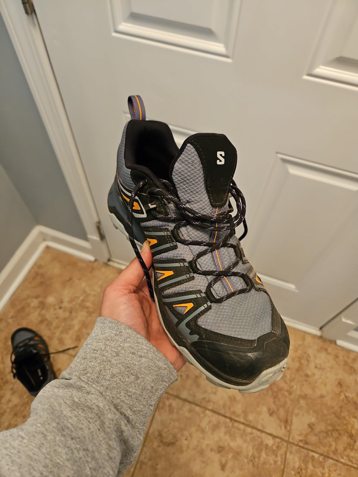 Salomon X Ultra Pioneer tested in wet conditions showing waterproof performance during creek crossing