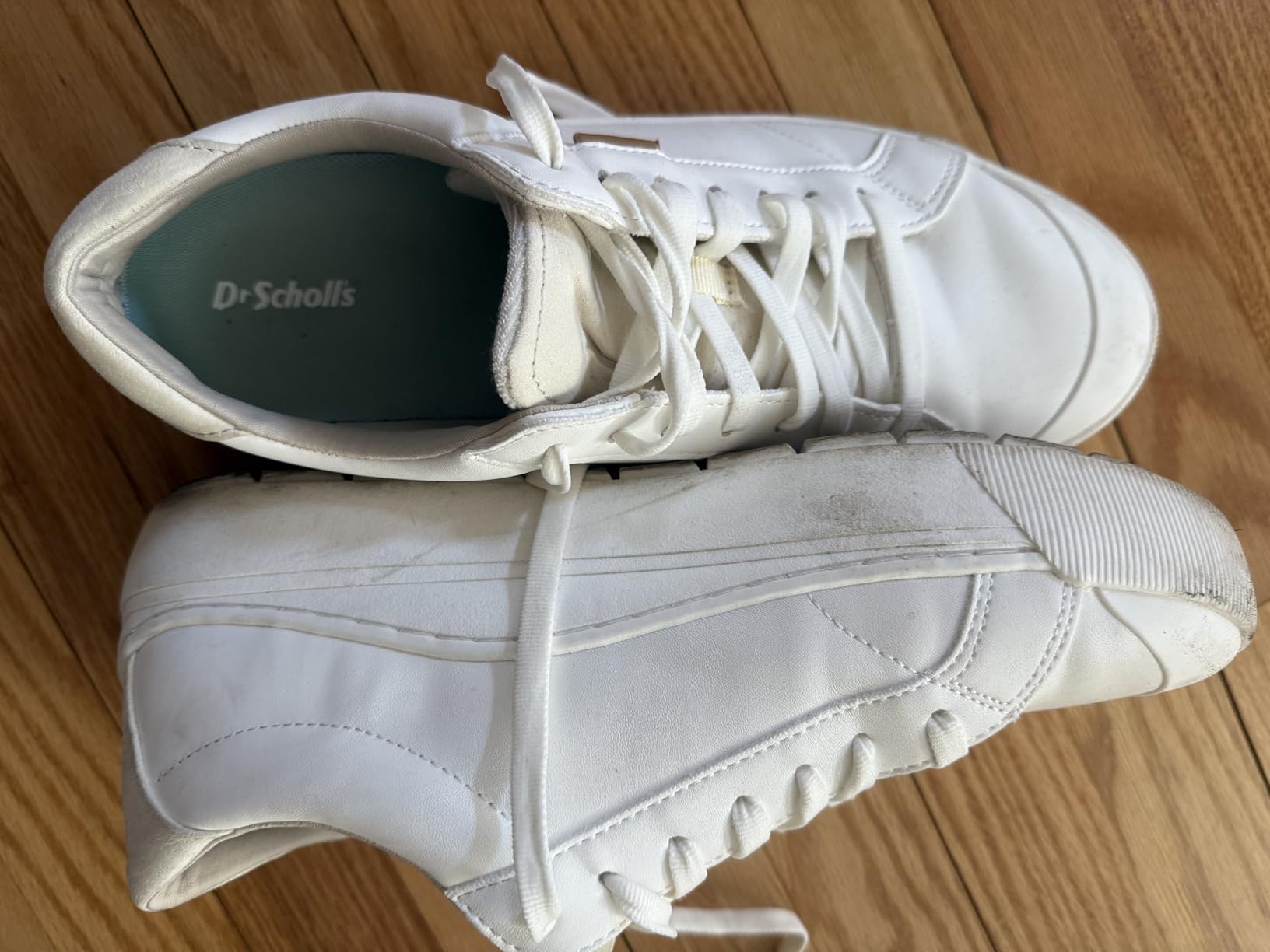 Dr. Scholl's Time Off sneaker product shot showing brand labeling and construction details
