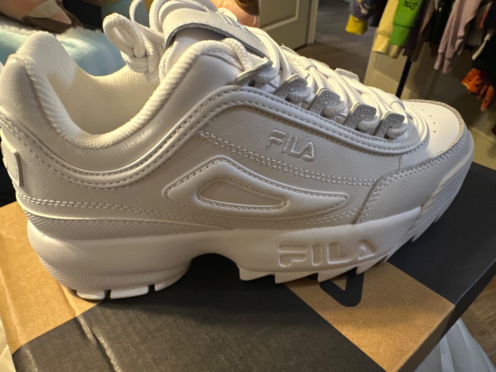 Fila Disruptor II sneakers in real-world casual wearing situation showing versatility