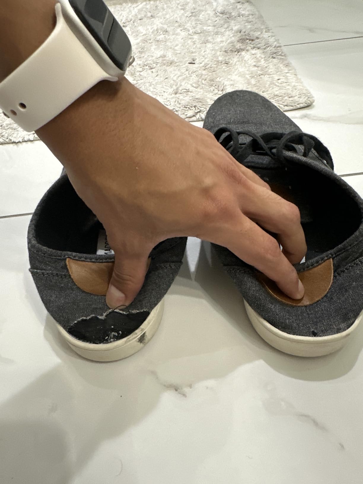 Heel fabric tearing on Steve Madden Fenta in office use