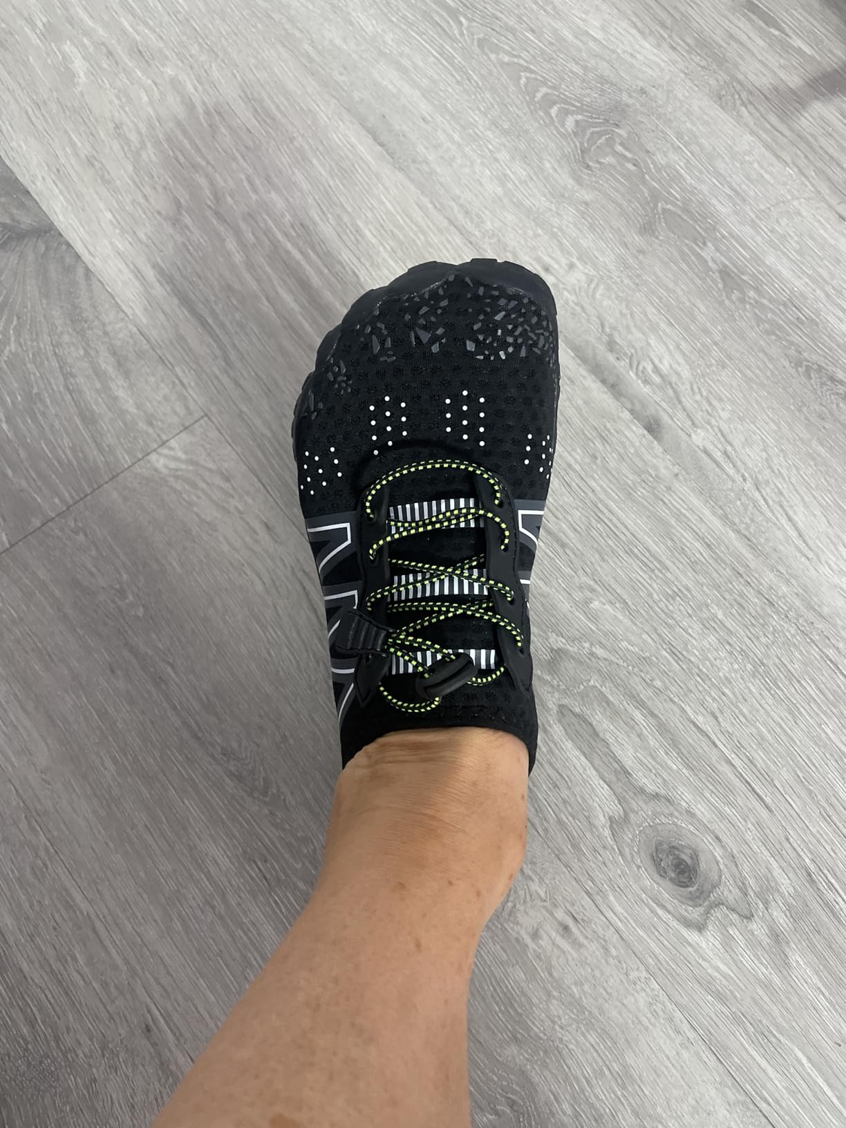 Family using water shoes for various activities showing real-world versatility