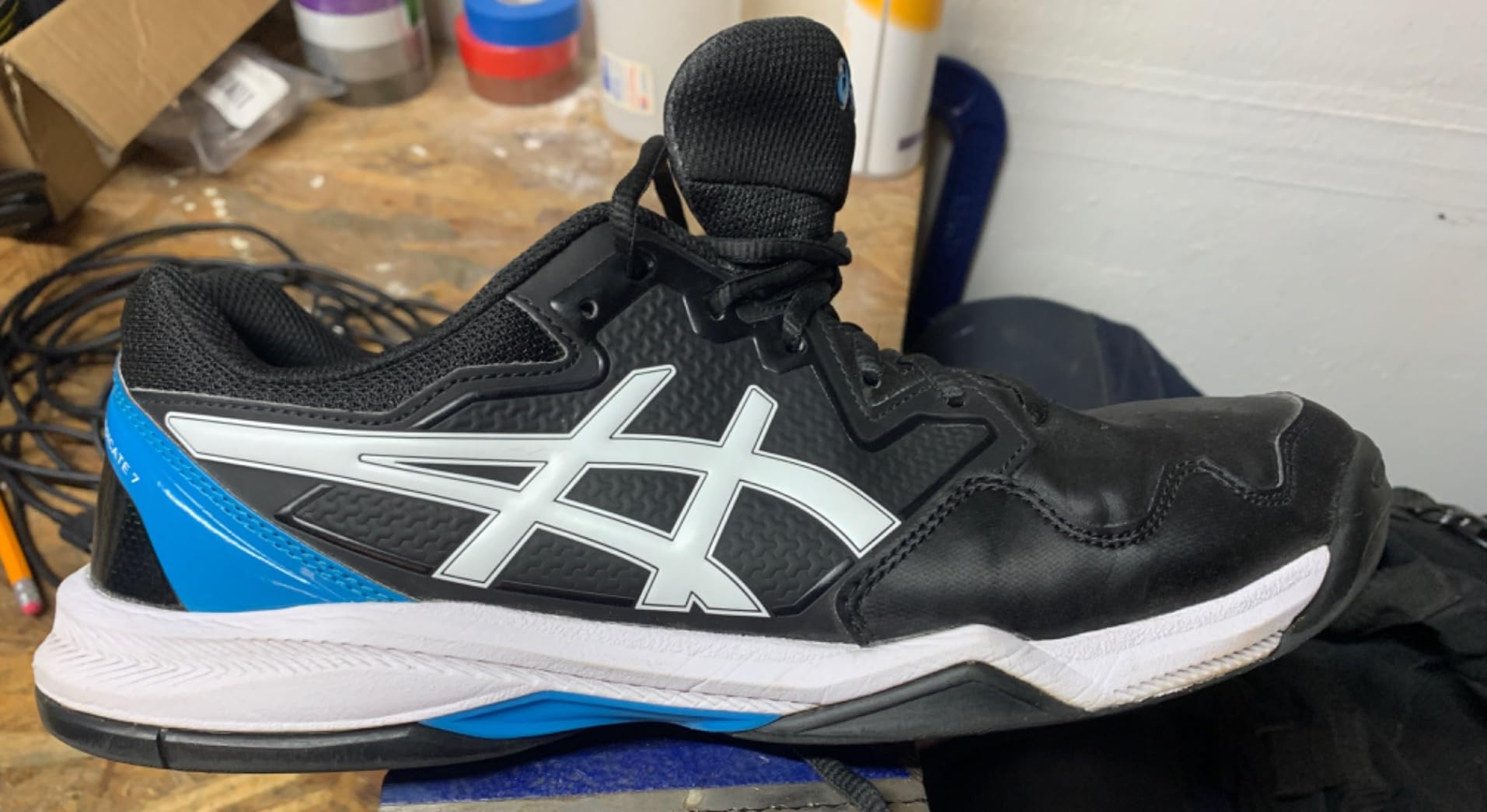 Severe sole wear showing holes through to midsole after 2 months of pickleball use