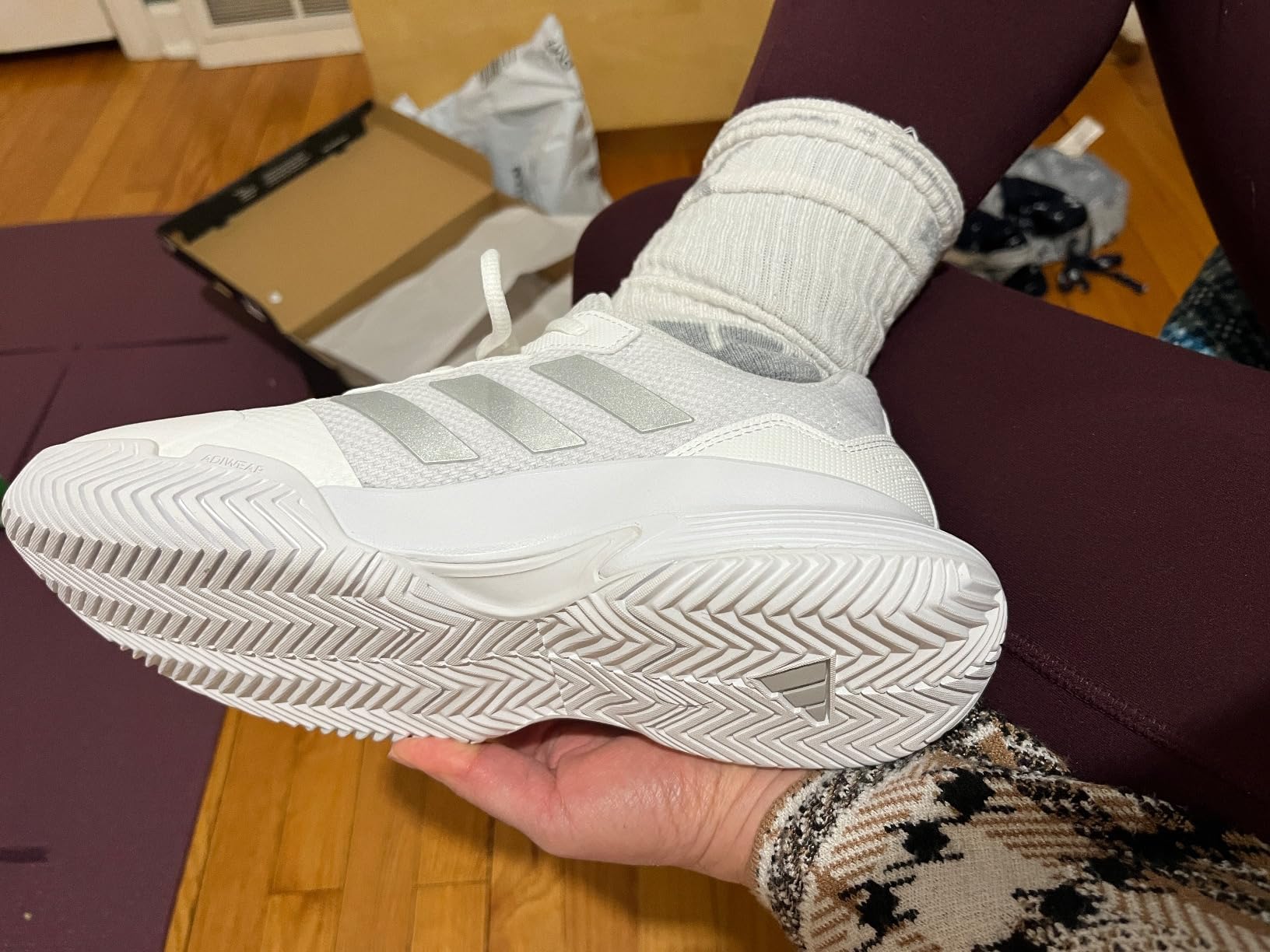 Multiple angles of Adidas Gamecourt 2 showing design details and construction quality