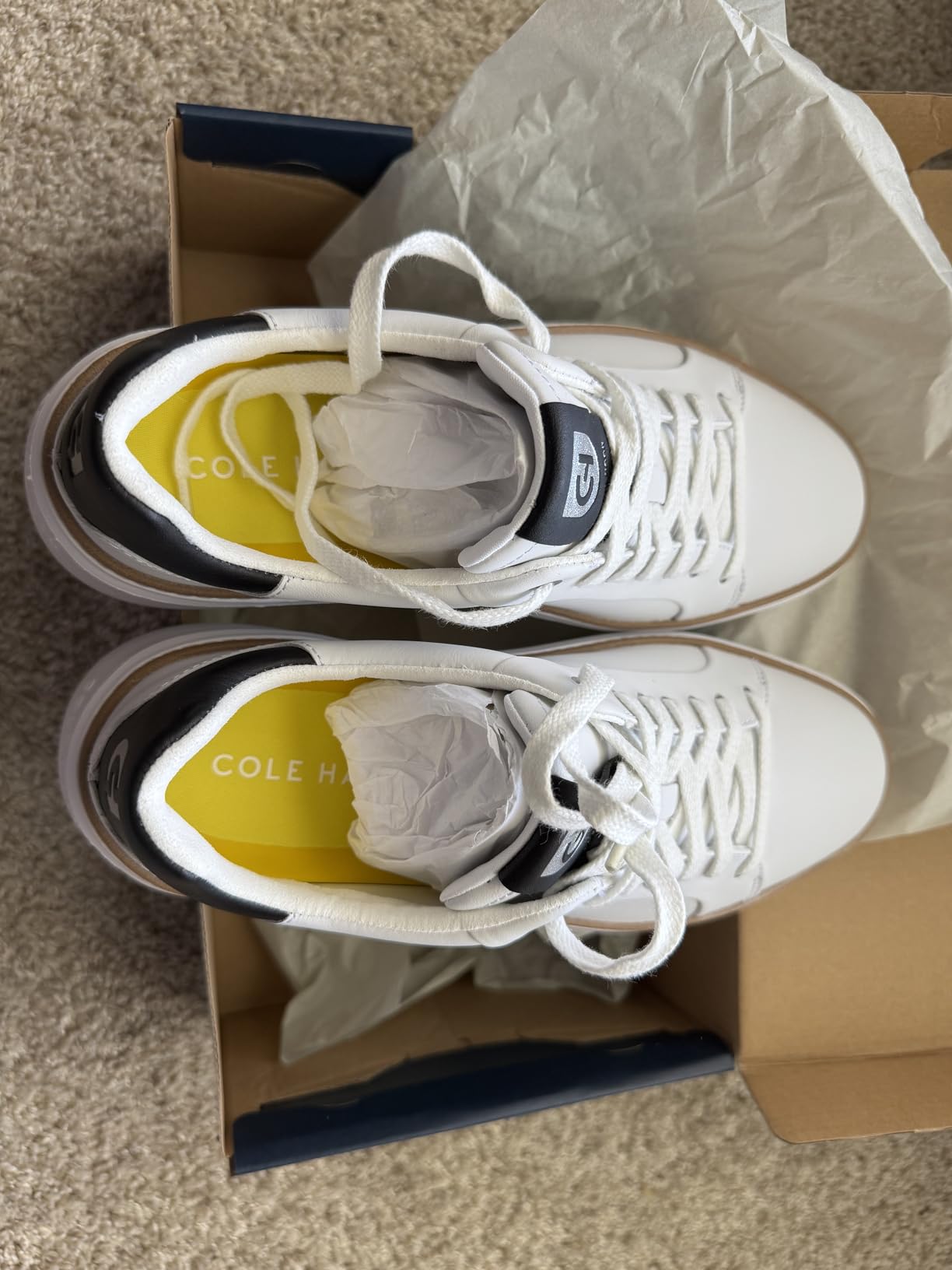 Bottom view of Cole Haan Grandpro showing the spikeless rubber traction pattern designed for golf and general use