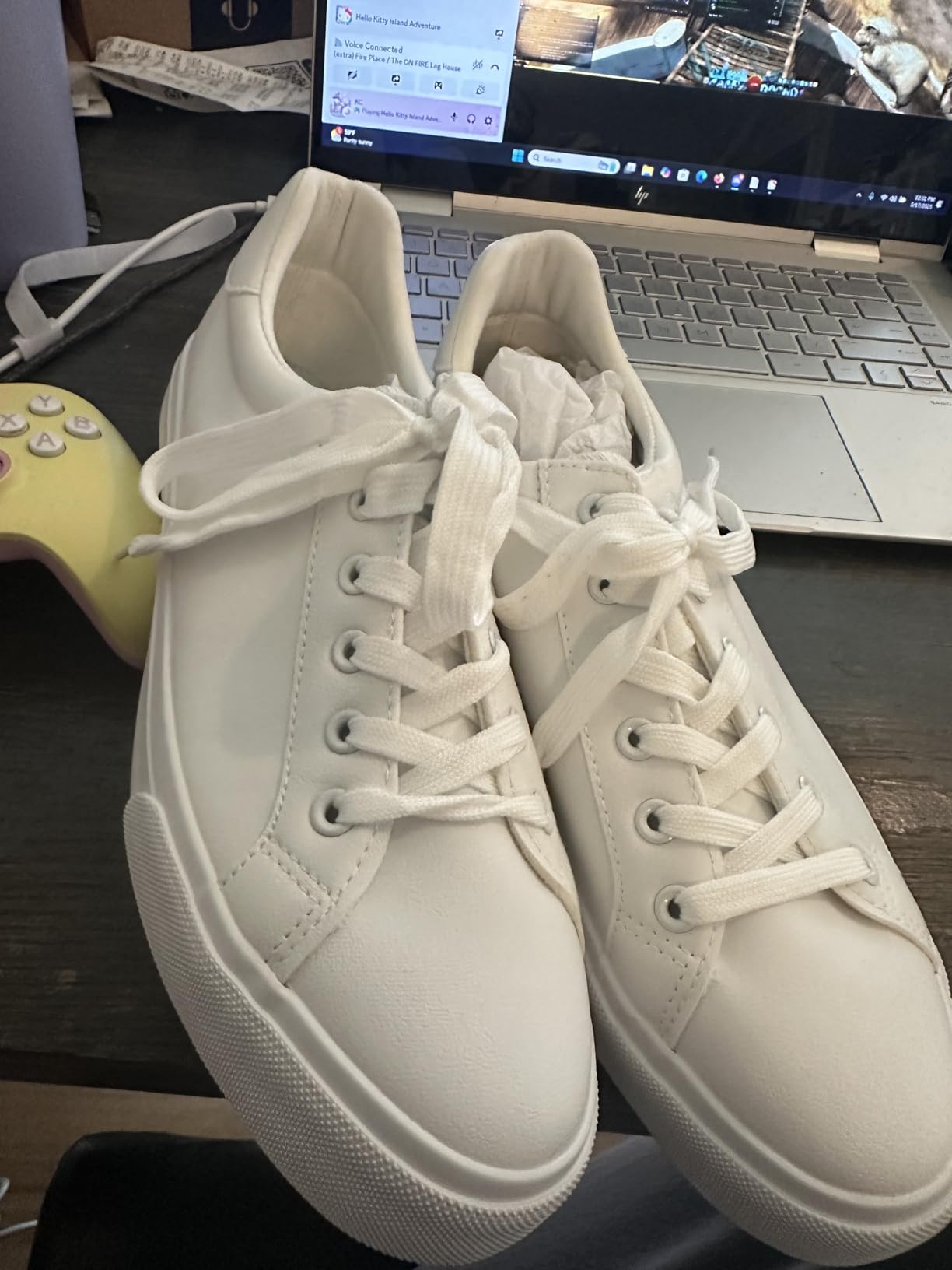 SERNIAL white tennis shoes showing clean minimalist design and PU leather construction