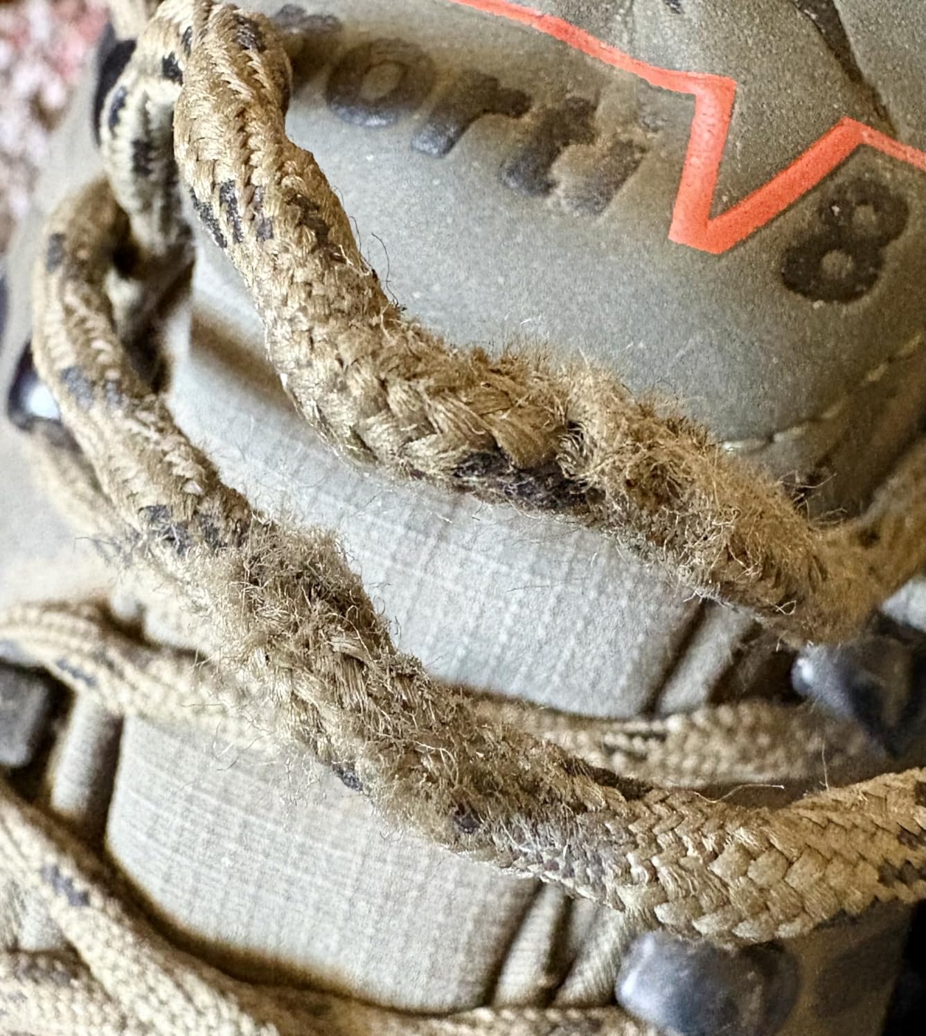NORTIV 8 hiking shoes in muddy conditions showing waterproof performance and sole traction