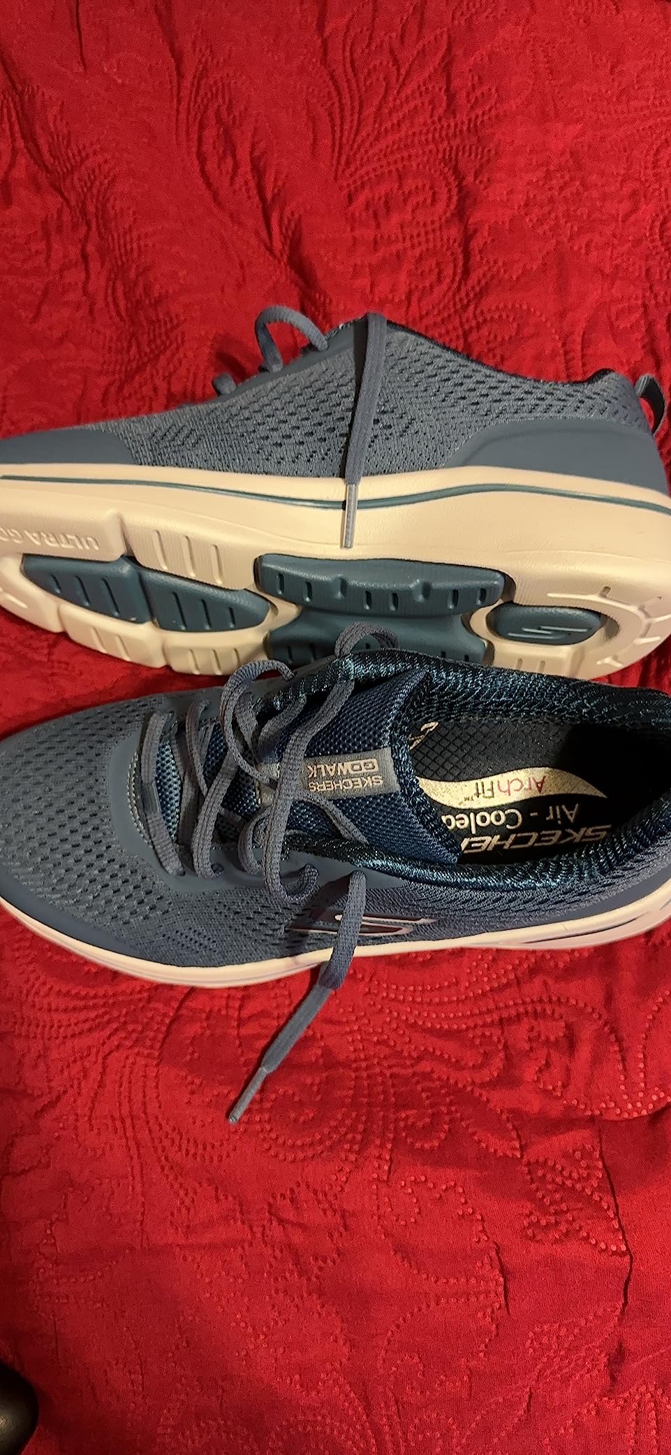 Skechers Arch Fit showing cushioning technology and comfort features from bottom angle