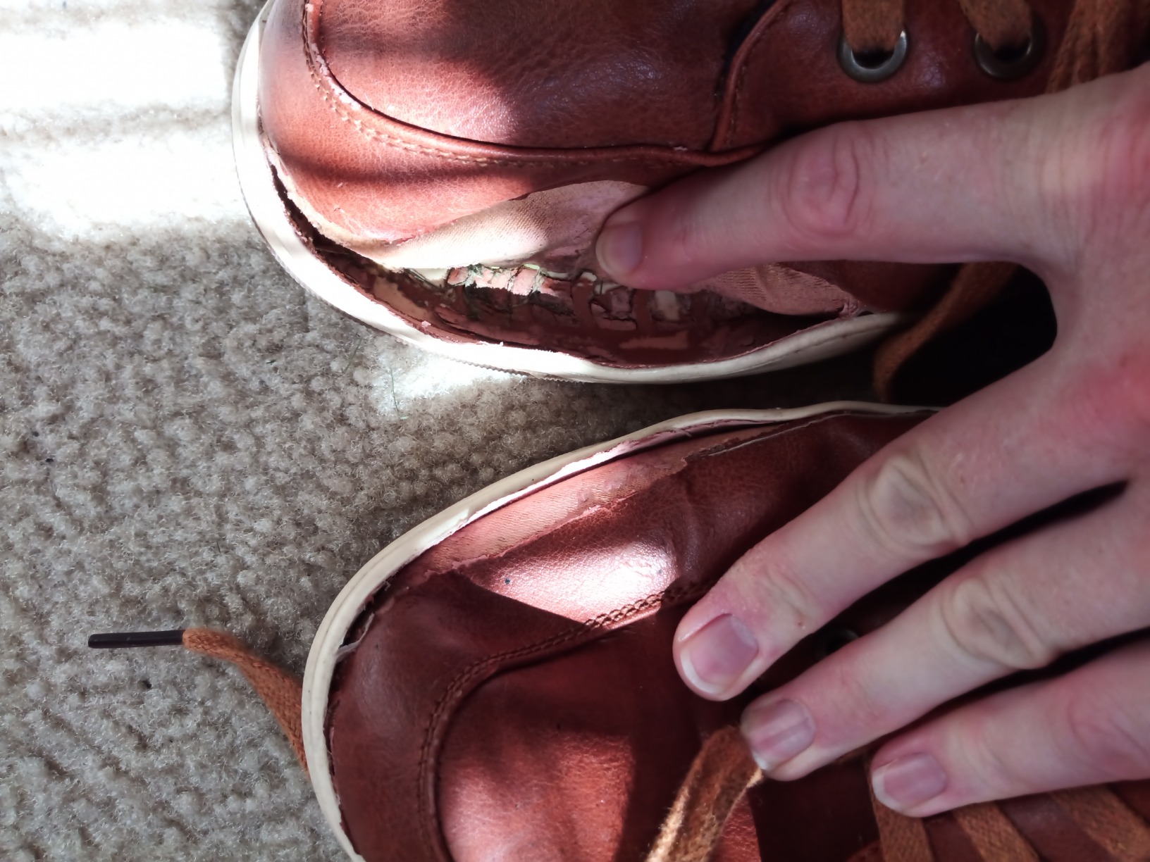 Customer review photos showing typical sole separation issues experienced by multiple users