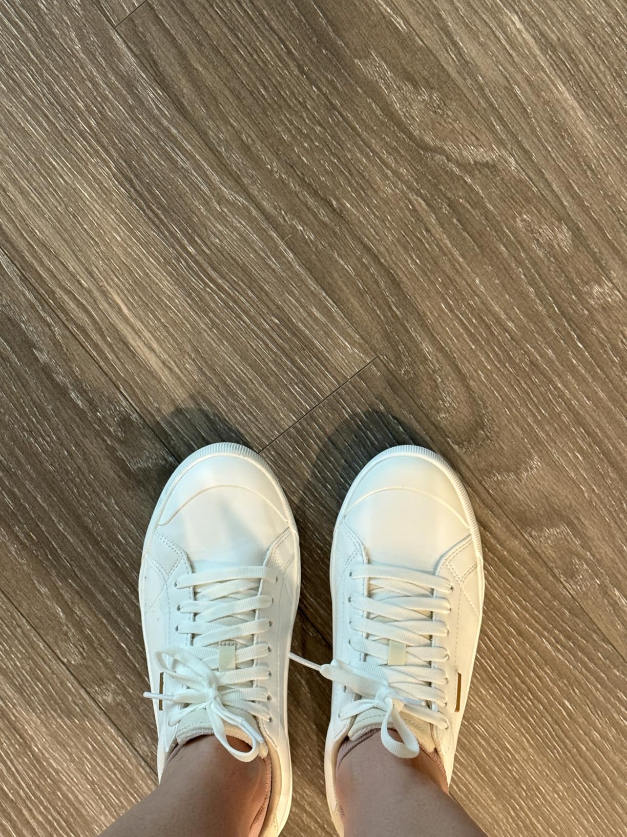 Comparison showing wide width Dr. Scholl's Time Off sneaker next to regular width, demonstrating toe box roominess