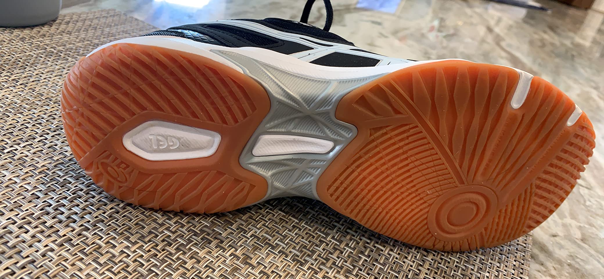 ASICS Gel-Rocket 10 in action during volleyball practice showing lateral movement stability
