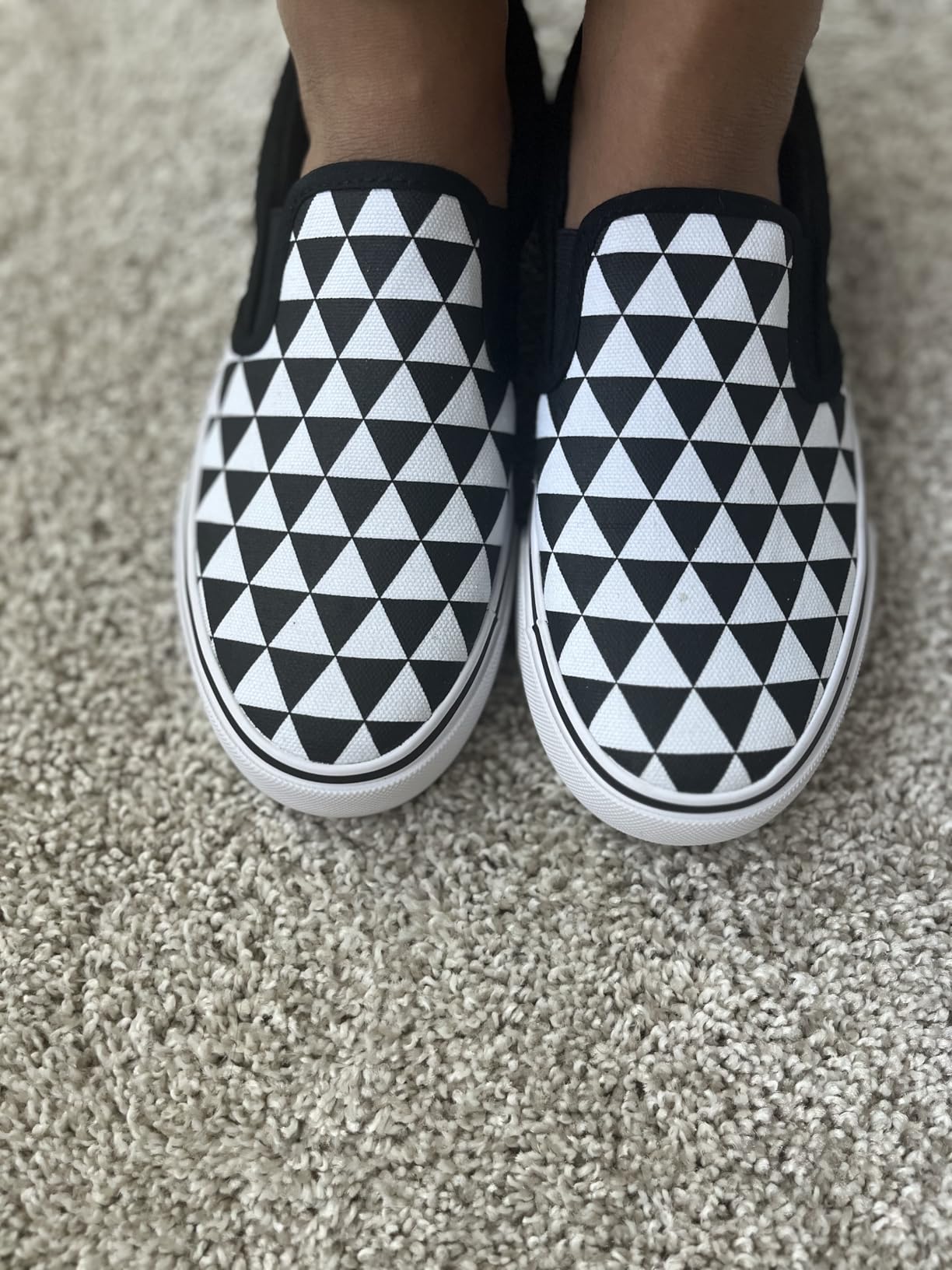 Testing slip-on sneakers in different weather and surface conditions for daily wear evaluation