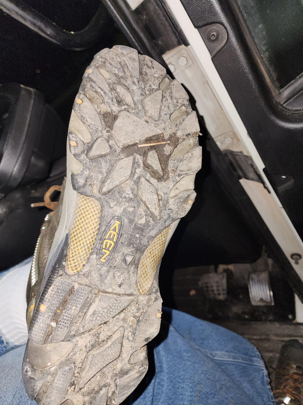 KEEN Voyageur hiking shoe showing leather upper construction and mesh ventilation panels