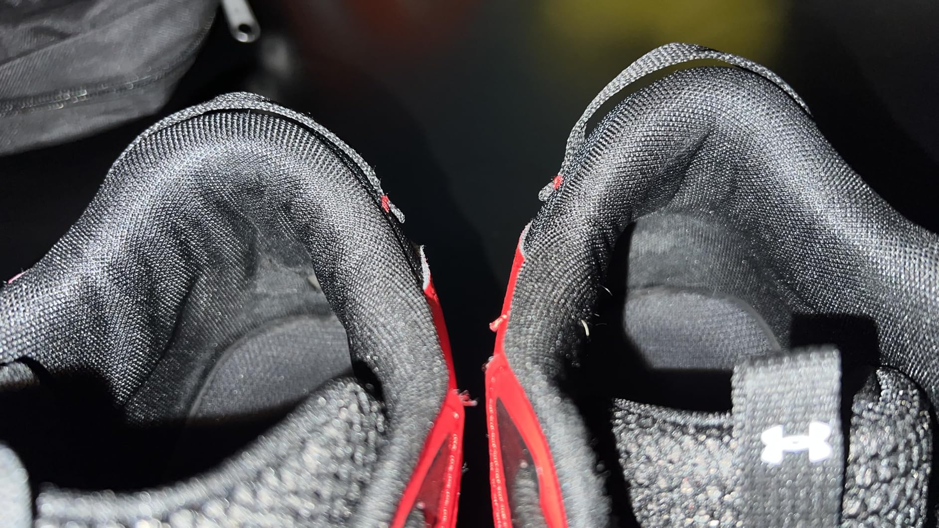 Under Armour Lockdown 6 detail shot showing mesh panel placement and lacing system for breathability
