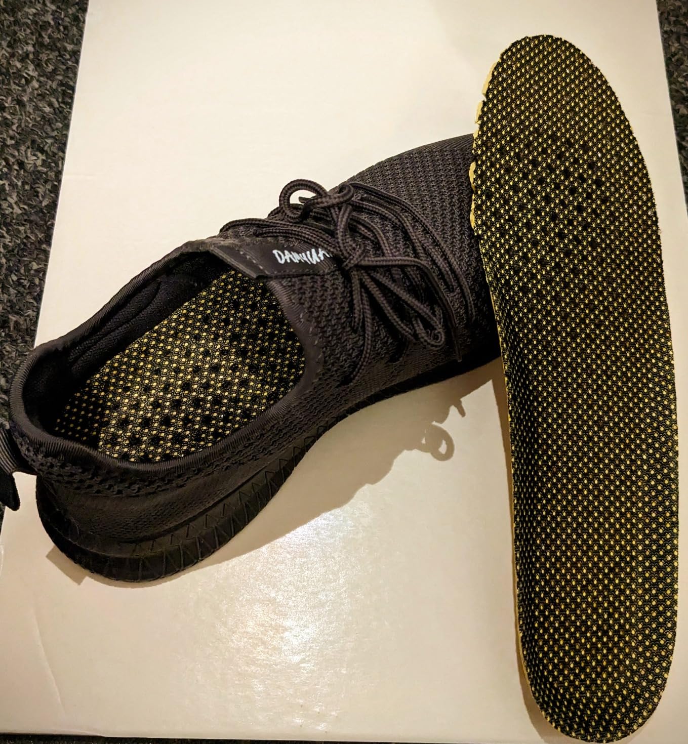 FUJEAK shoe sole pattern showing anti-slip texture design and EVA construction