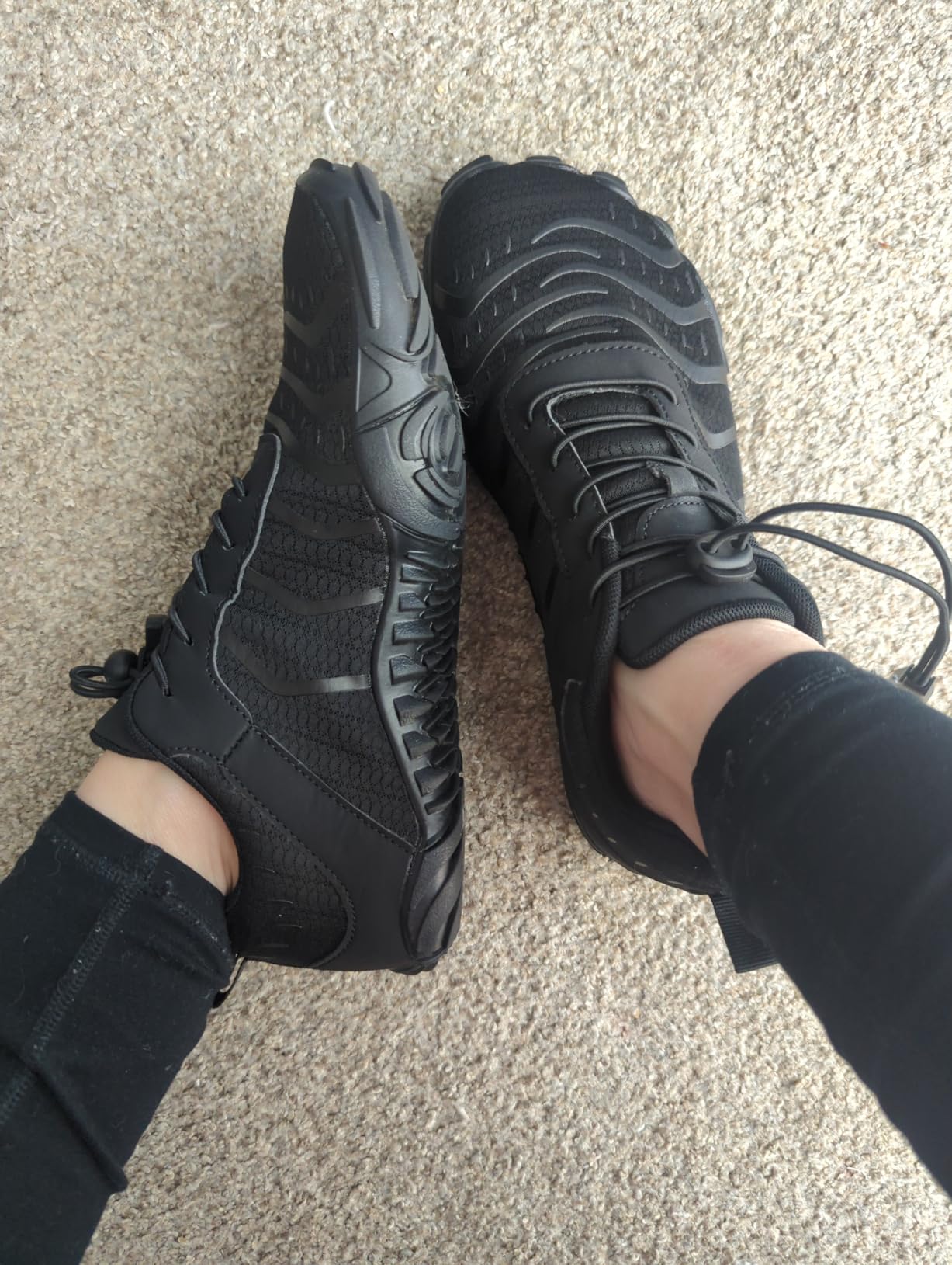 Comparison showing wide toe box versus traditional shoe shape