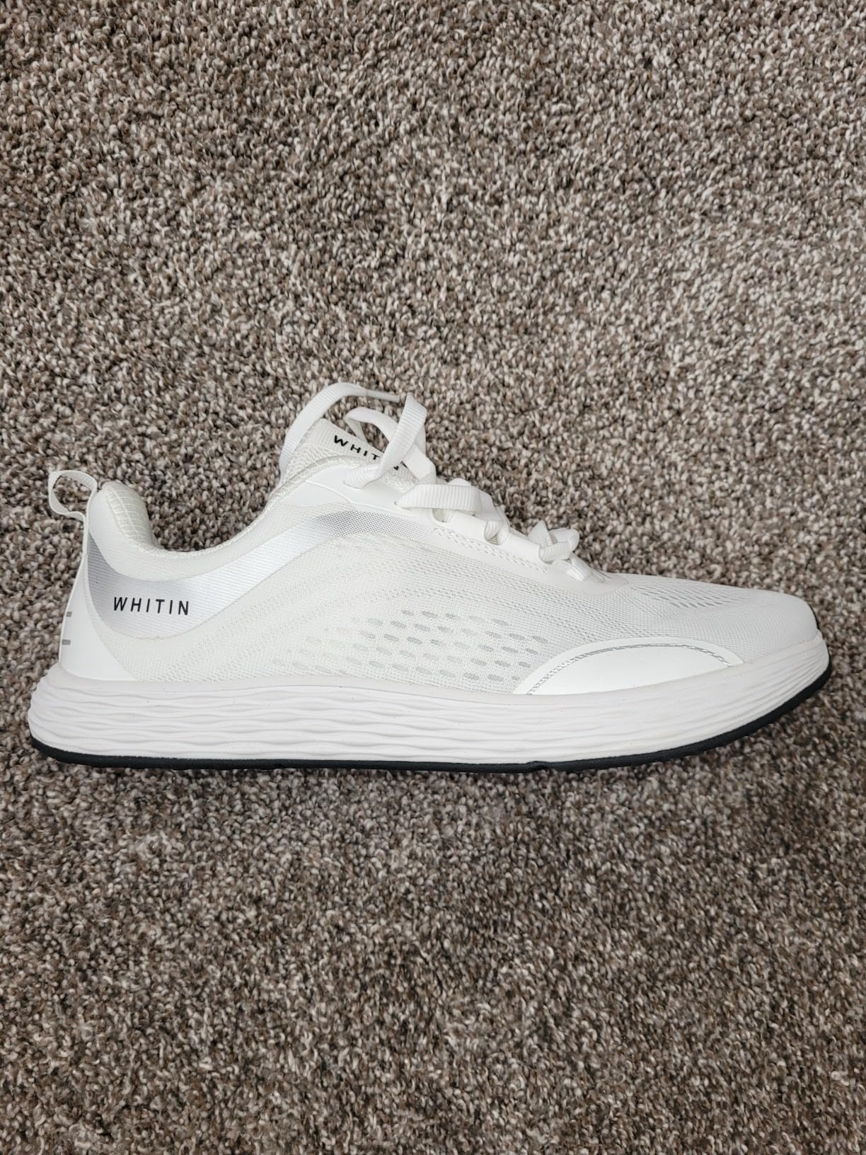 Final product shot of WHITIN Men's Zero Drop Running Shoes showing overall design