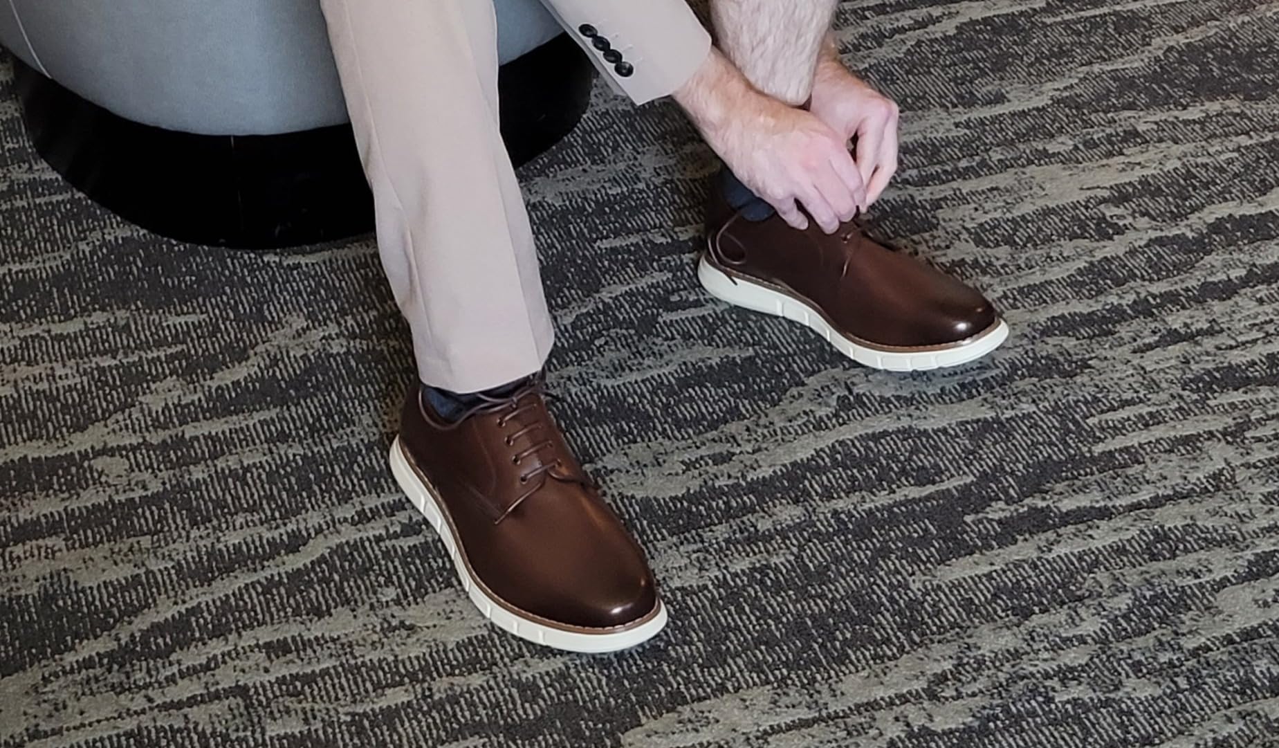Bruno Marc dress sneakers styled with formal business attire showing versatility and professional appearance