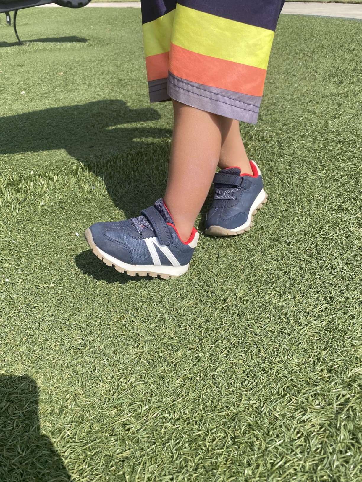 Carter's Bailey sneaker flexibility test showing bendable sole construction