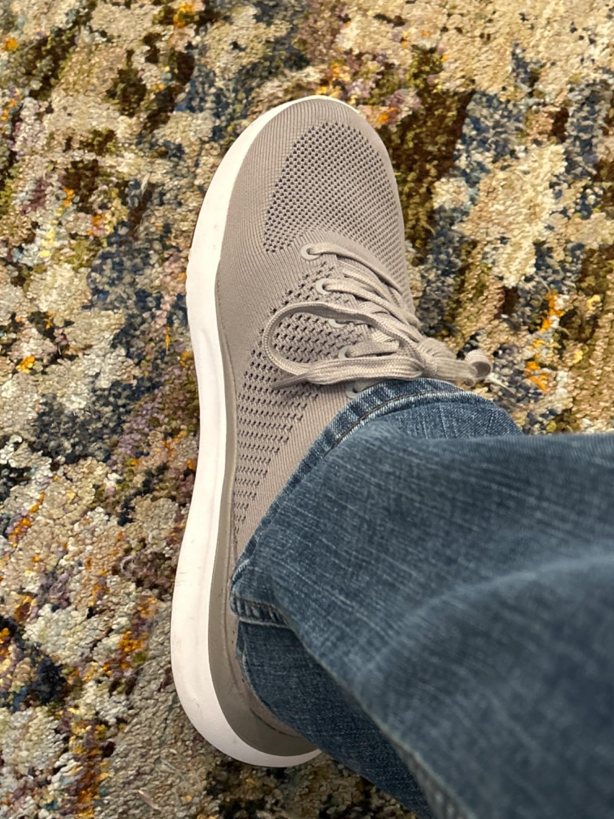 Side view demonstrating the heel rebound technology and slip-on mechanism