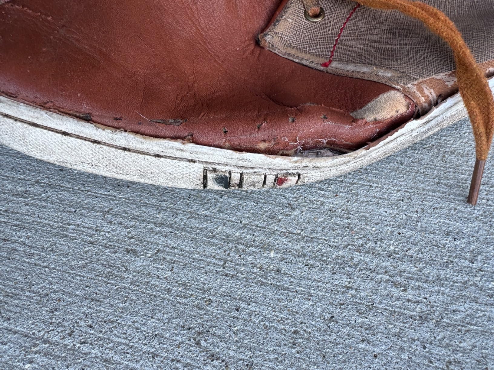 Side profile view of Bruno Marc fashion sneakers showing sleek silhouette and sole construction