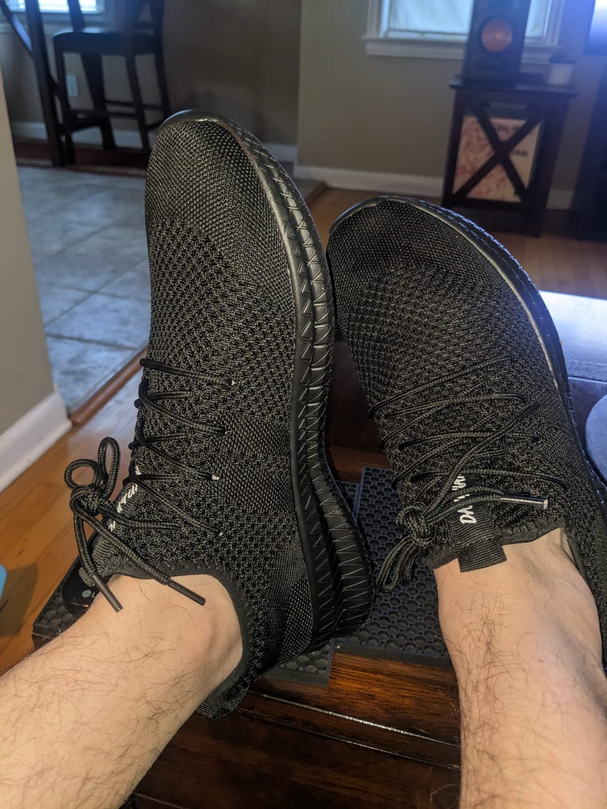 Close-up view of FUJEAK shoe showing mesh construction and lacing system detail