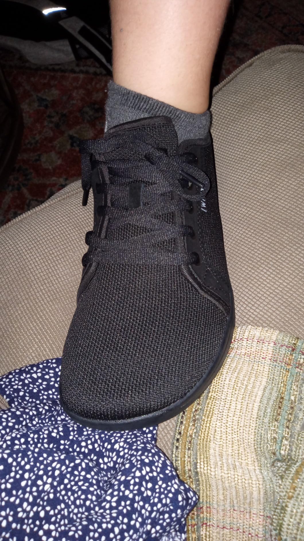 Final product shot of WHITIN barefoot sneakers showing overall design