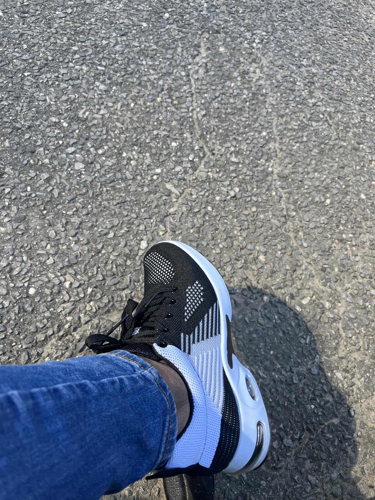 Side view of Padgene women's athletic sneakers showing air cushion sole design