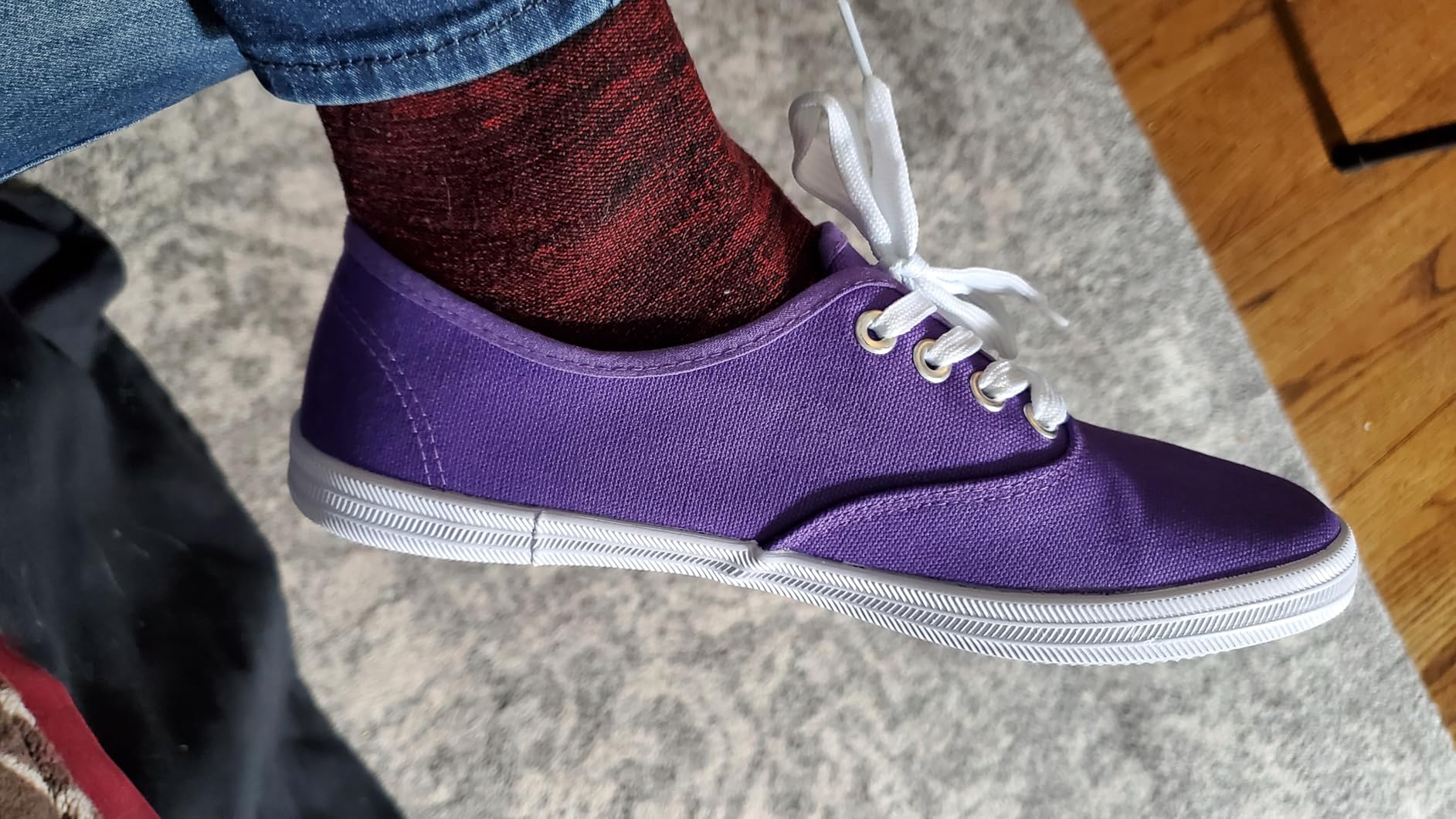 TUOPIN women's sneakers worn outdoors showing real-world styling with jeans